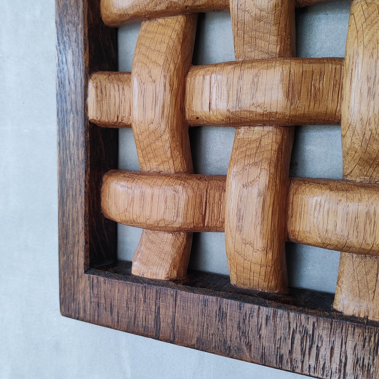 A carved sculptural oak lattice panel wall relief Mouseman studio apprentice piece