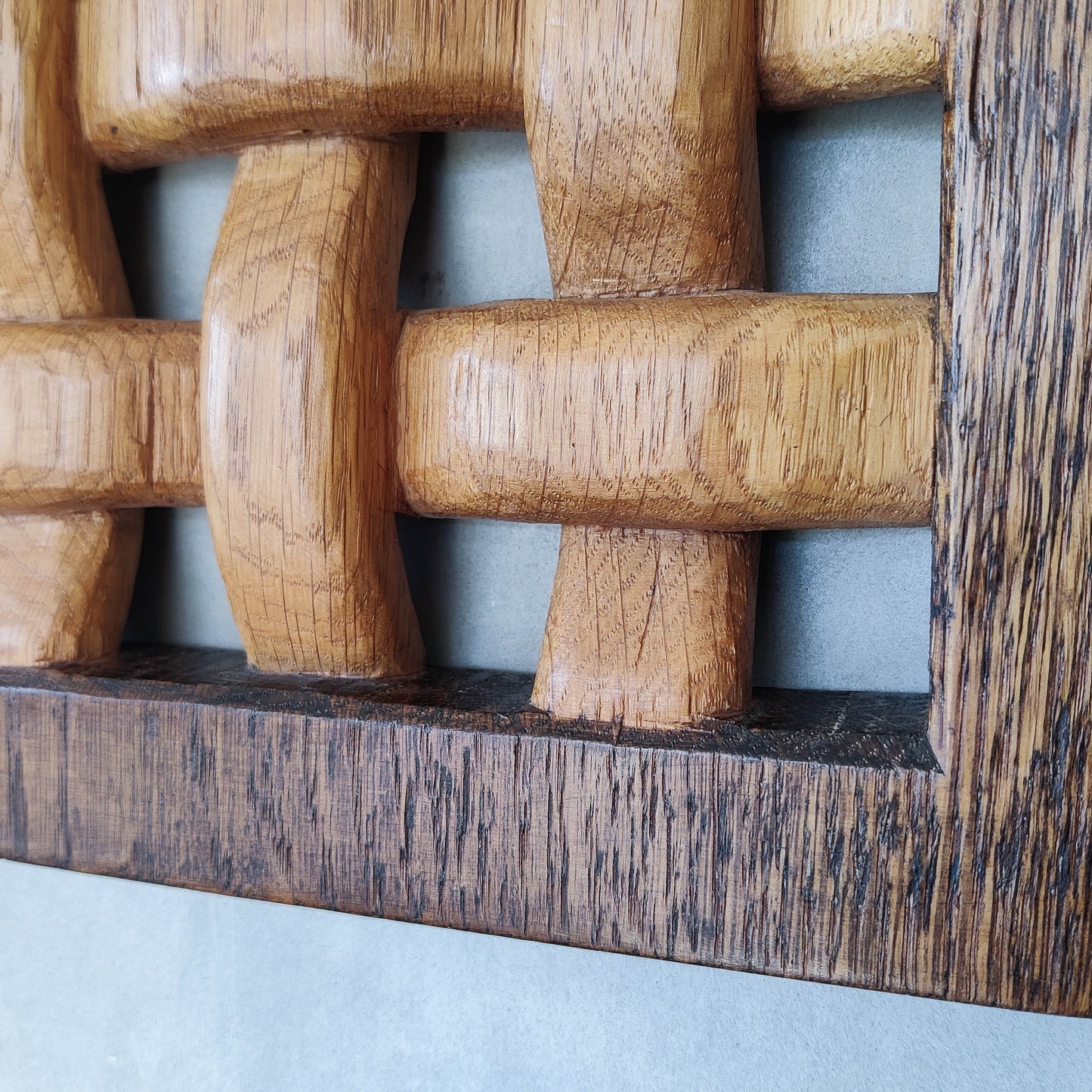 A carved sculptural oak lattice panel wall relief Mouseman studio apprentice piece