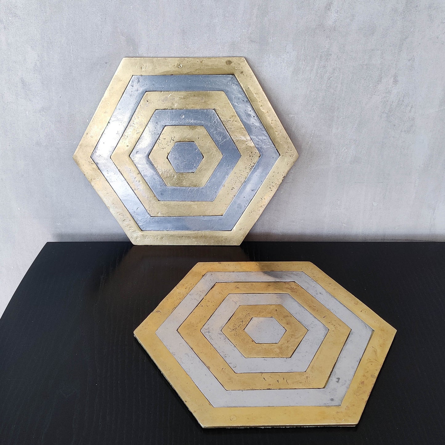 Pair of David Marshall brutalist 1980s large hand cast brass and aluminium large trivets/trays