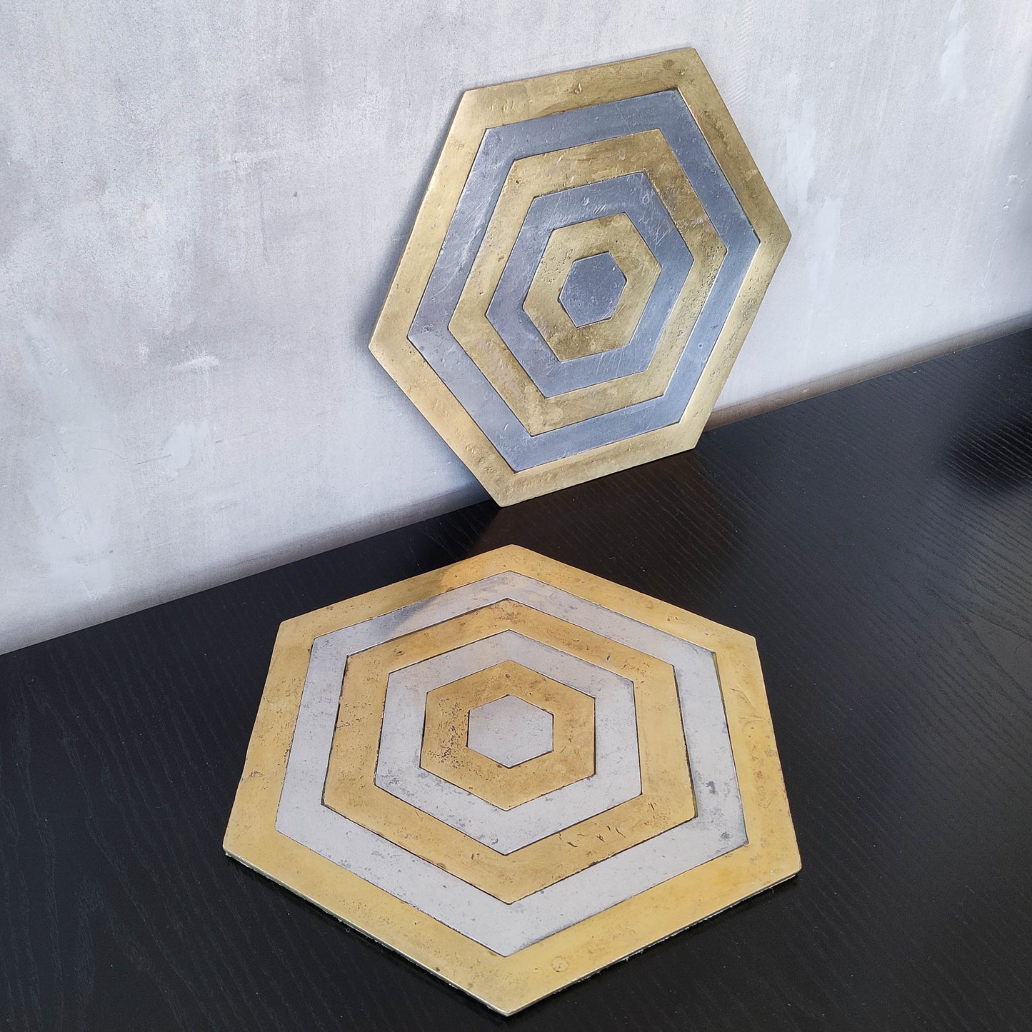Pair of David Marshall brutalist 1980s large hand cast brass and aluminium large trivets/trays