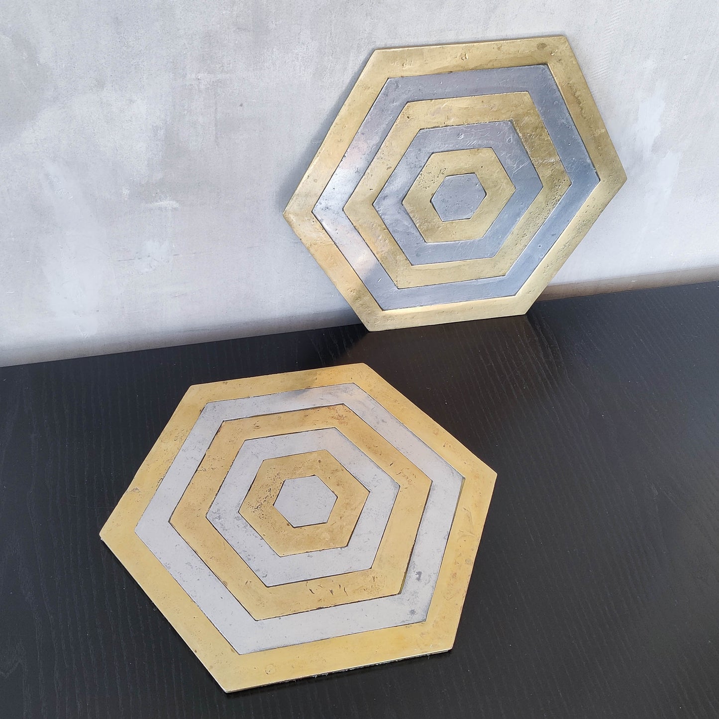 Pair of David Marshall brutalist 1980s large hand cast brass and aluminium large trivets/trays