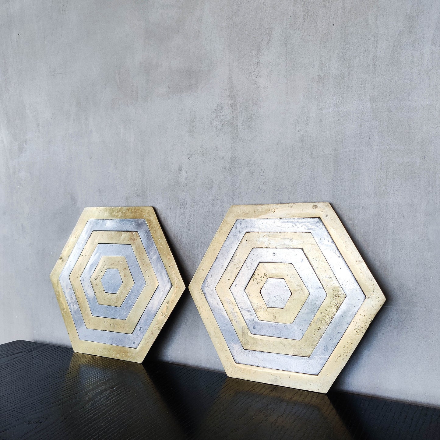 Pair of David Marshall brutalist 1980s large hand cast brass and aluminium large trivets/trays
