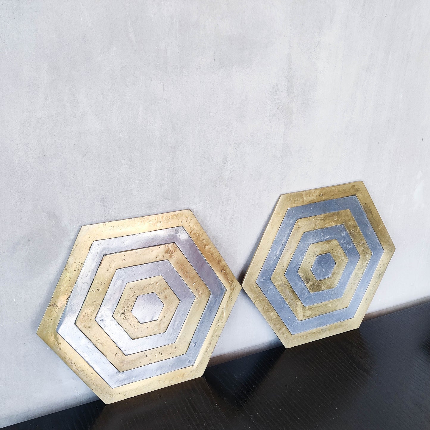 Pair of David Marshall brutalist 1980s large hand cast brass and aluminium large trivets/trays