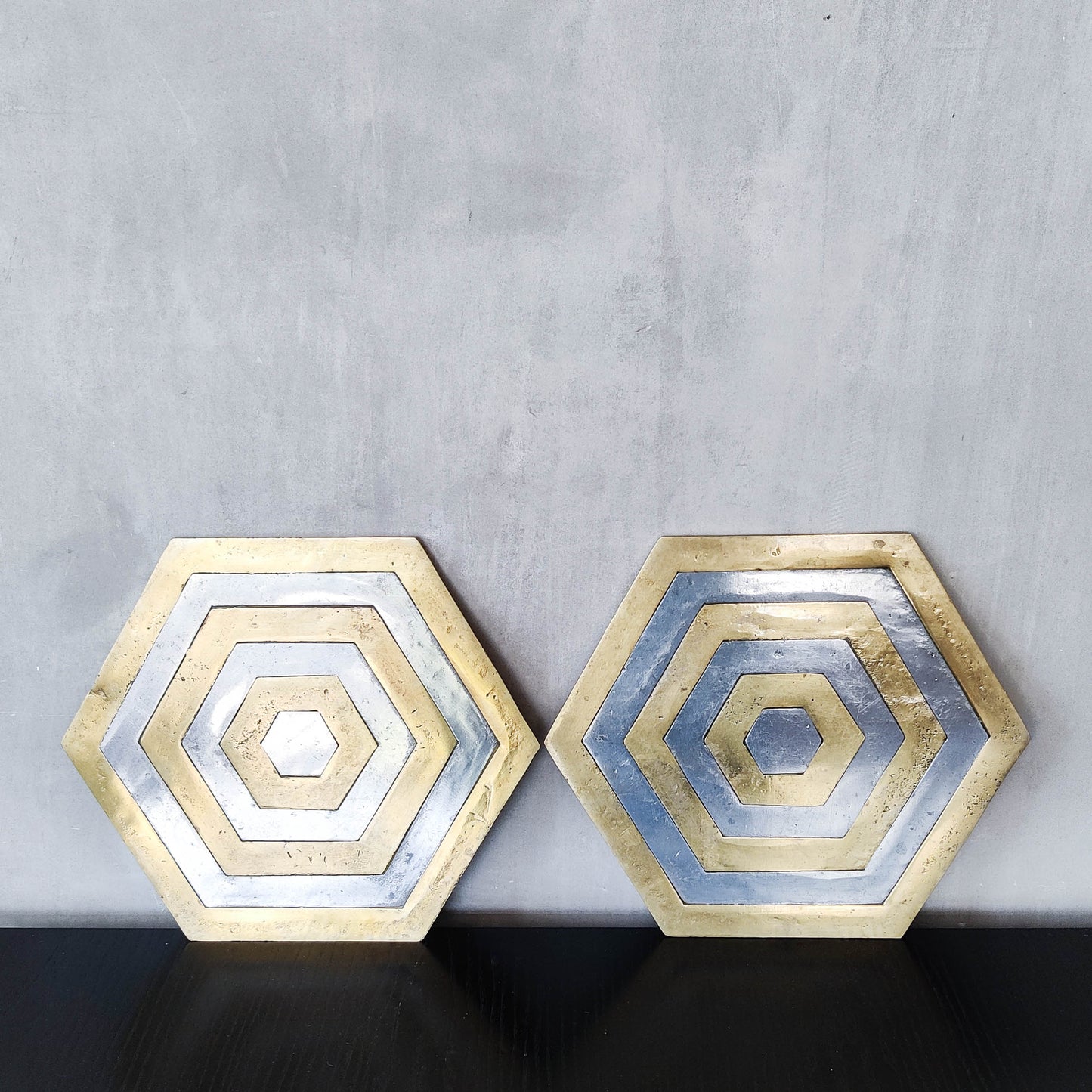 Pair of David Marshall brutalist 1980s large hand cast brass and aluminium large trivets/trays