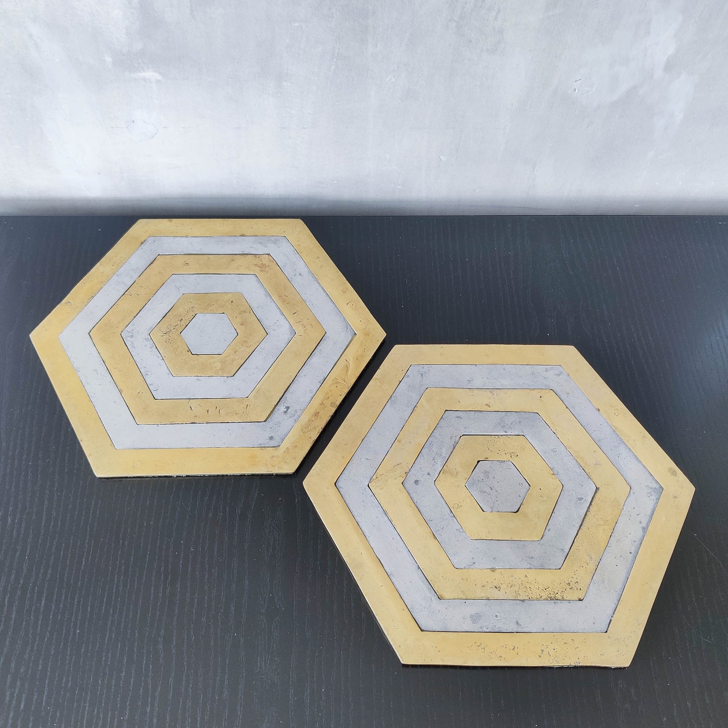 Pair of David Marshall brutalist 1980s large hand cast brass and aluminium large trivets/trays