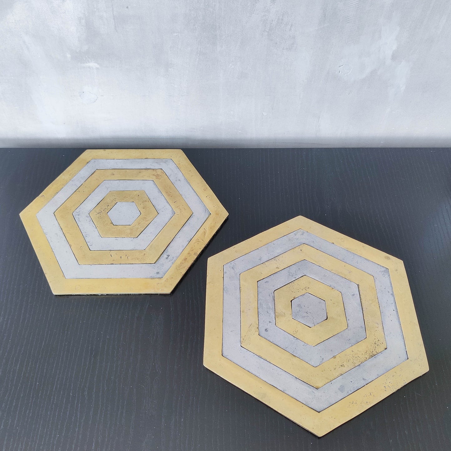 Pair of David Marshall brutalist 1980s large hand cast brass and aluminium large trivets/trays