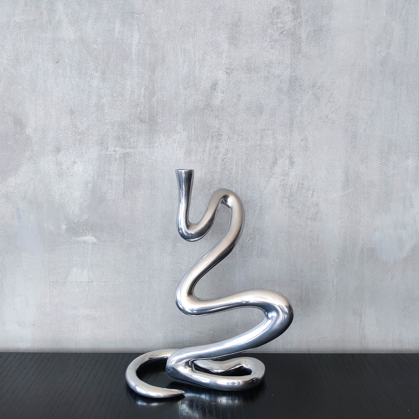 00s cast aluminium sculptural wavy candle holder