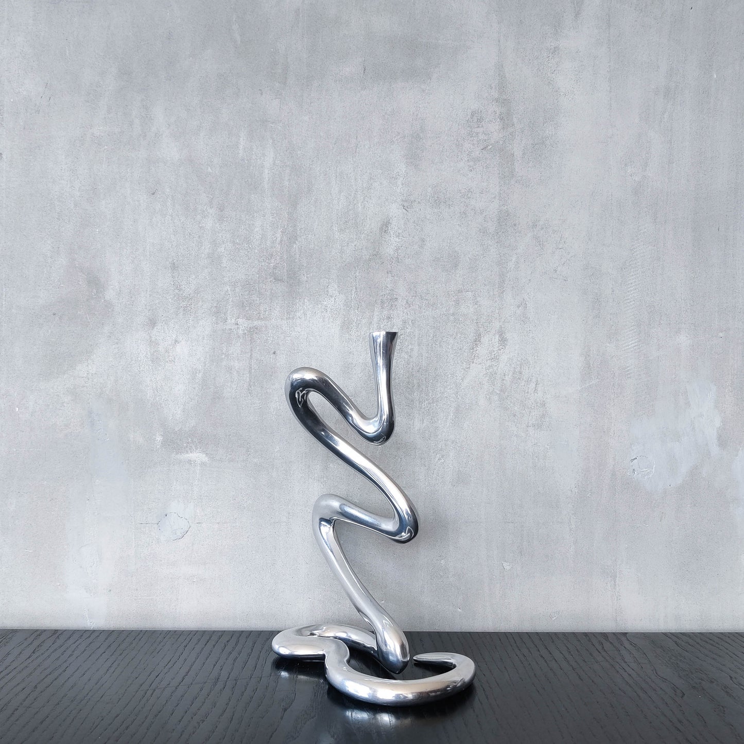00s cast aluminium sculptural wavy candle holder