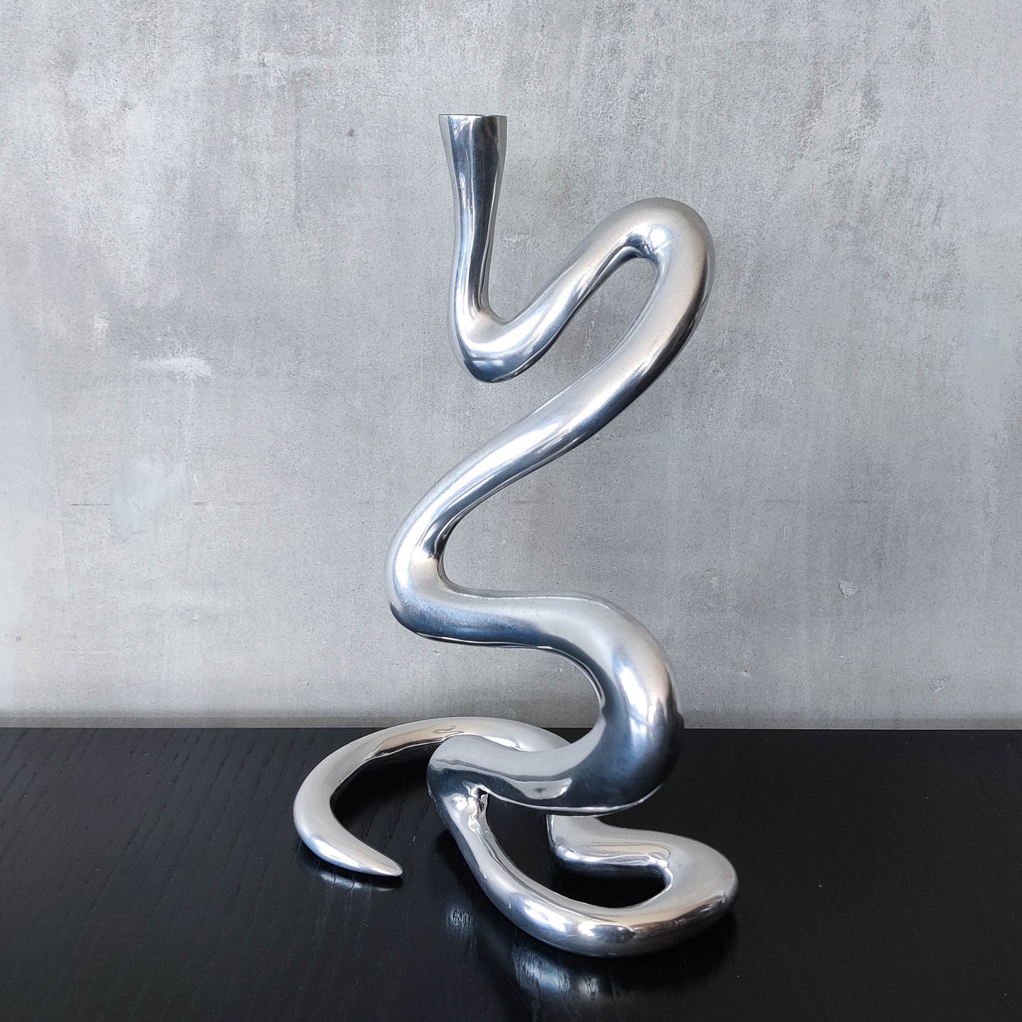 00s cast aluminium sculptural wavy candle holder