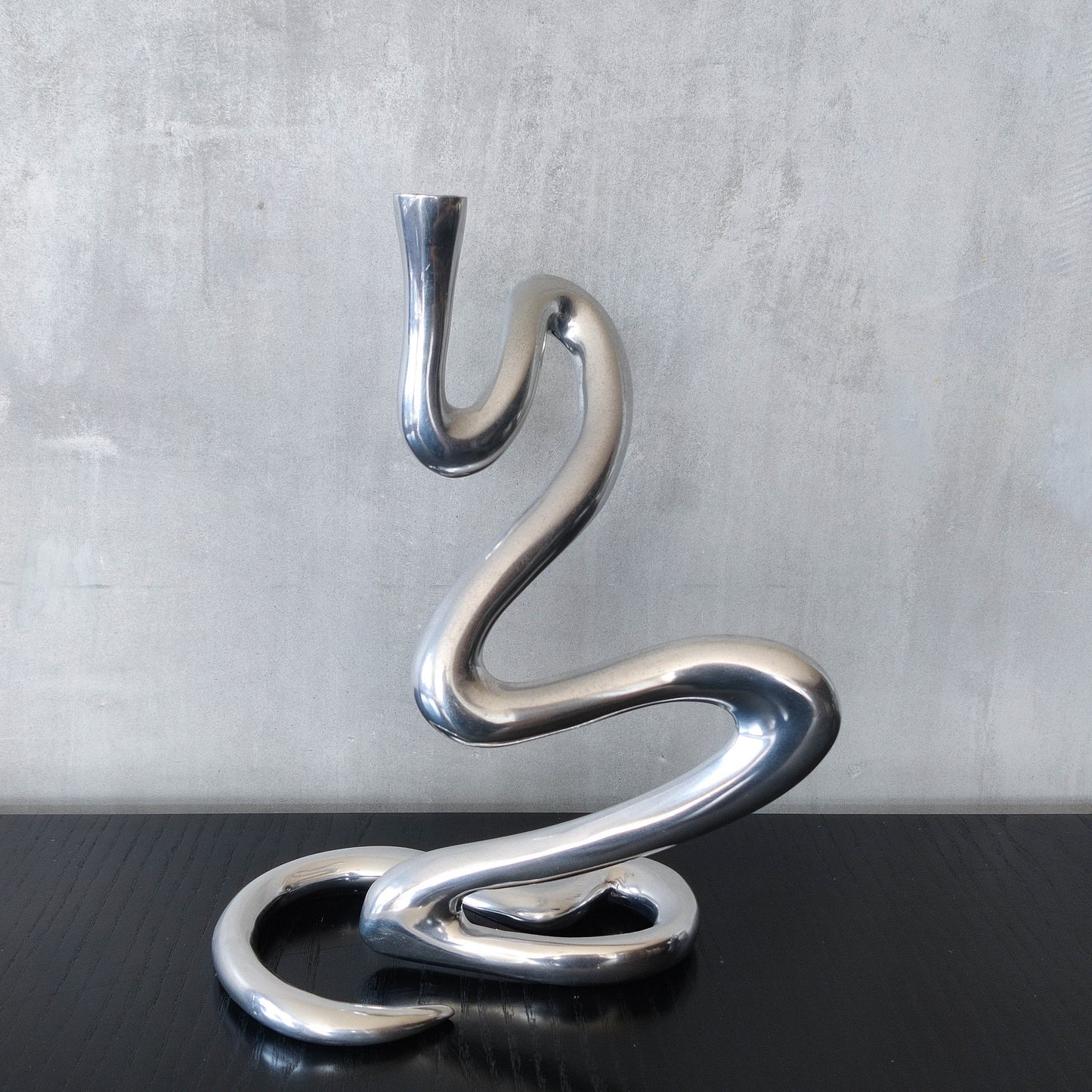 00s cast aluminium sculptural wavy candle holder