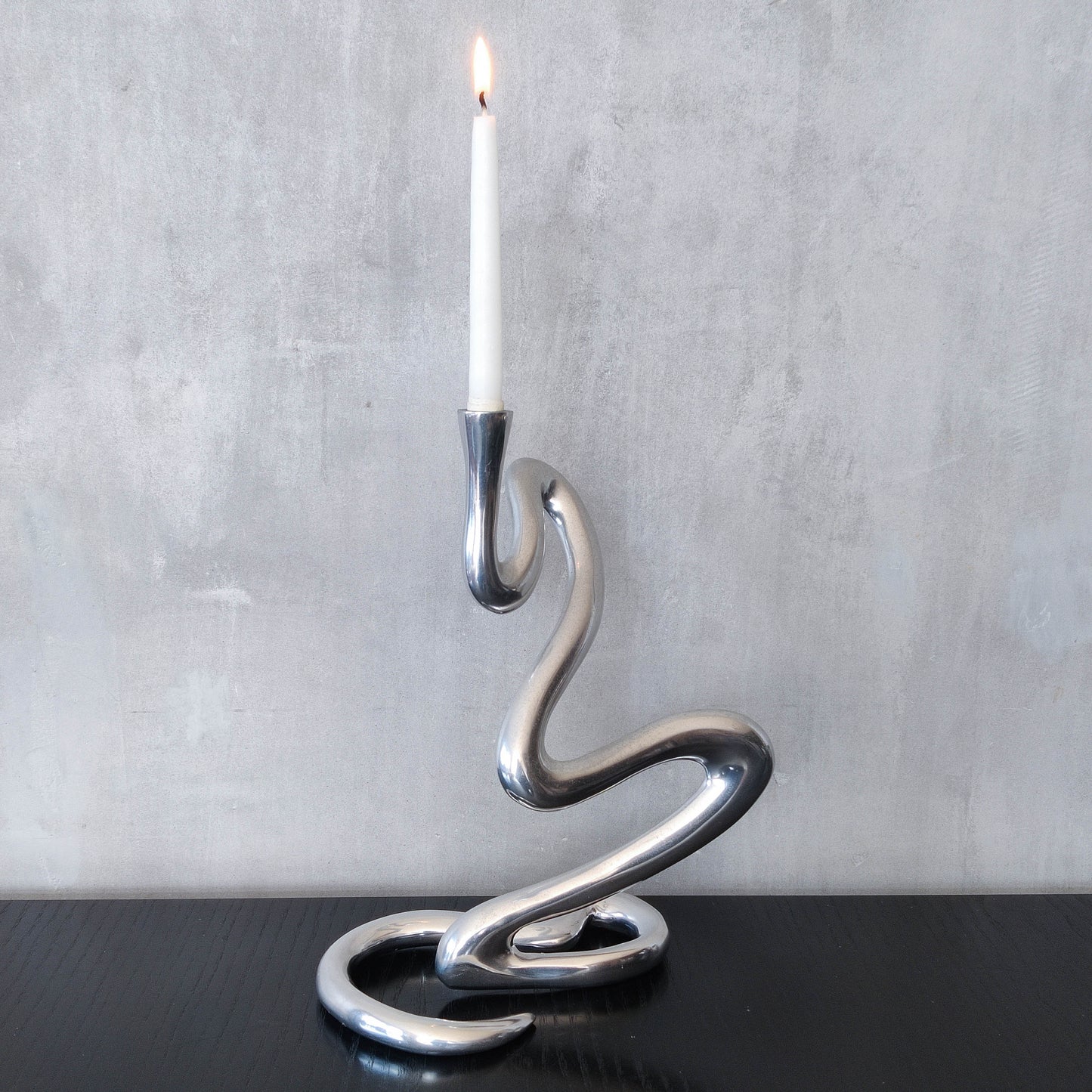 00s cast aluminium sculptural wavy candle holder