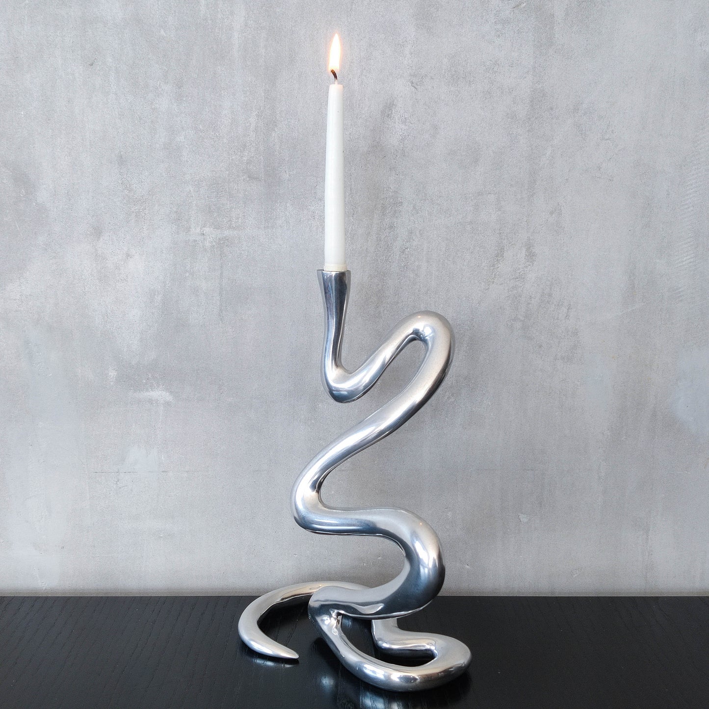 00s cast aluminium sculptural wavy candle holder