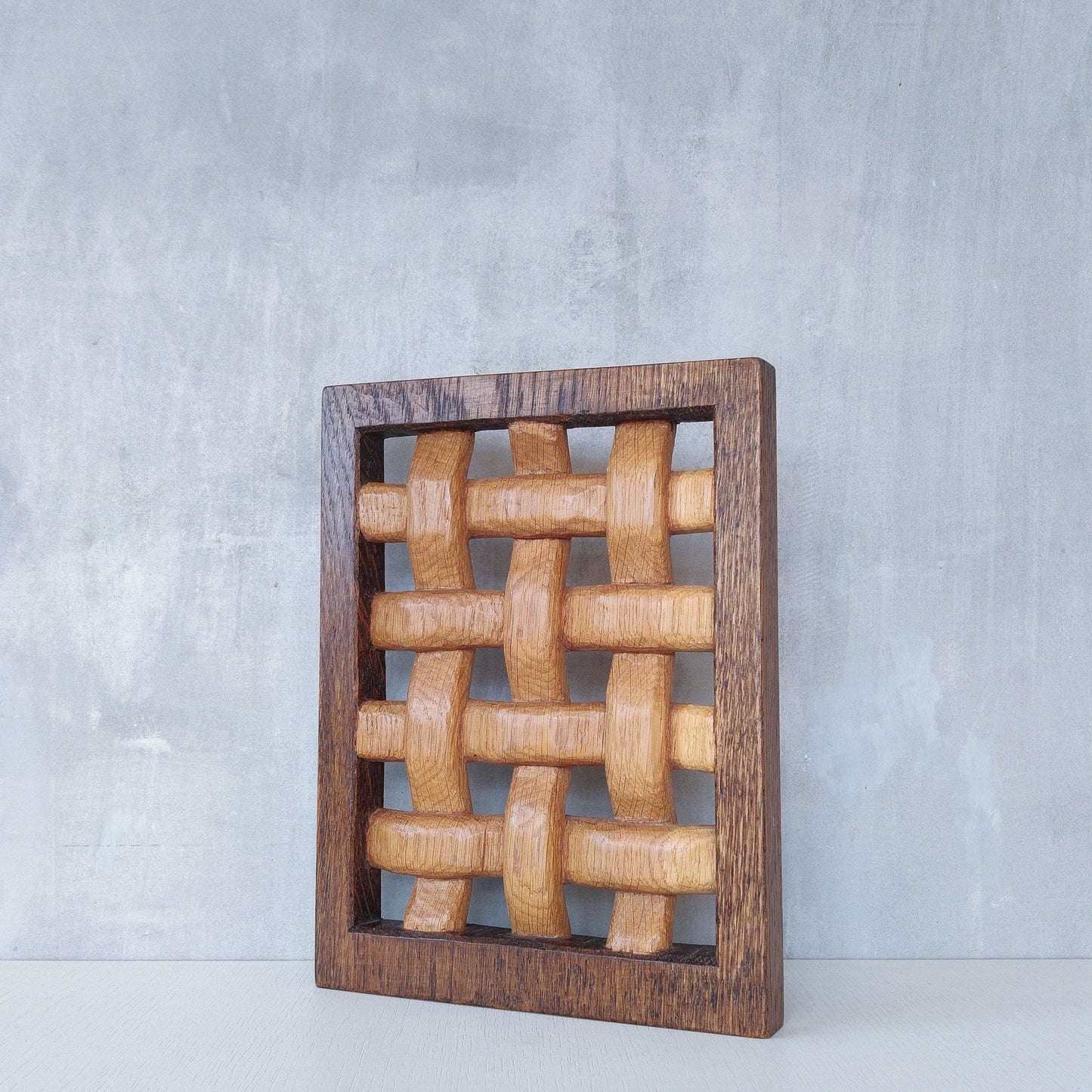 A carved sculptural oak lattice panel wall relief Mouseman studio apprentice piece