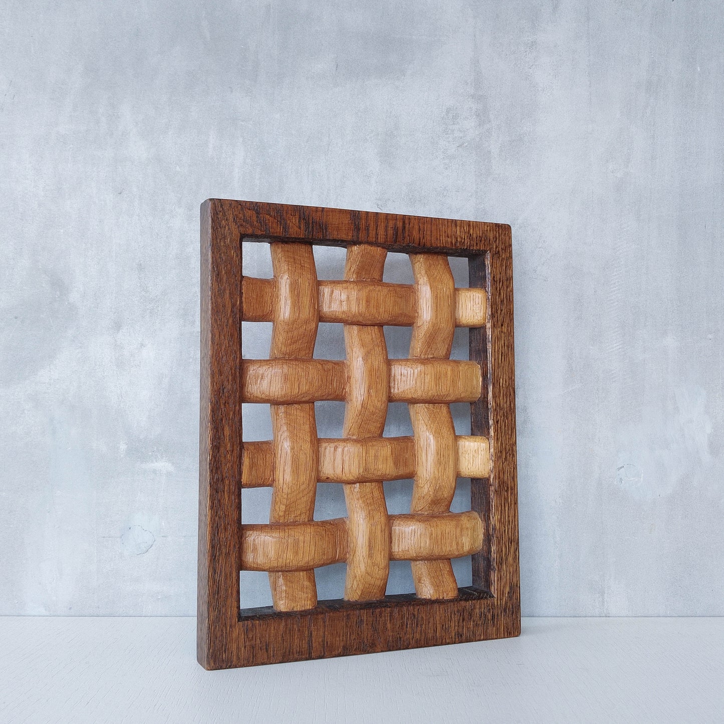 A carved sculptural oak lattice panel wall relief Mouseman studio apprentice piece