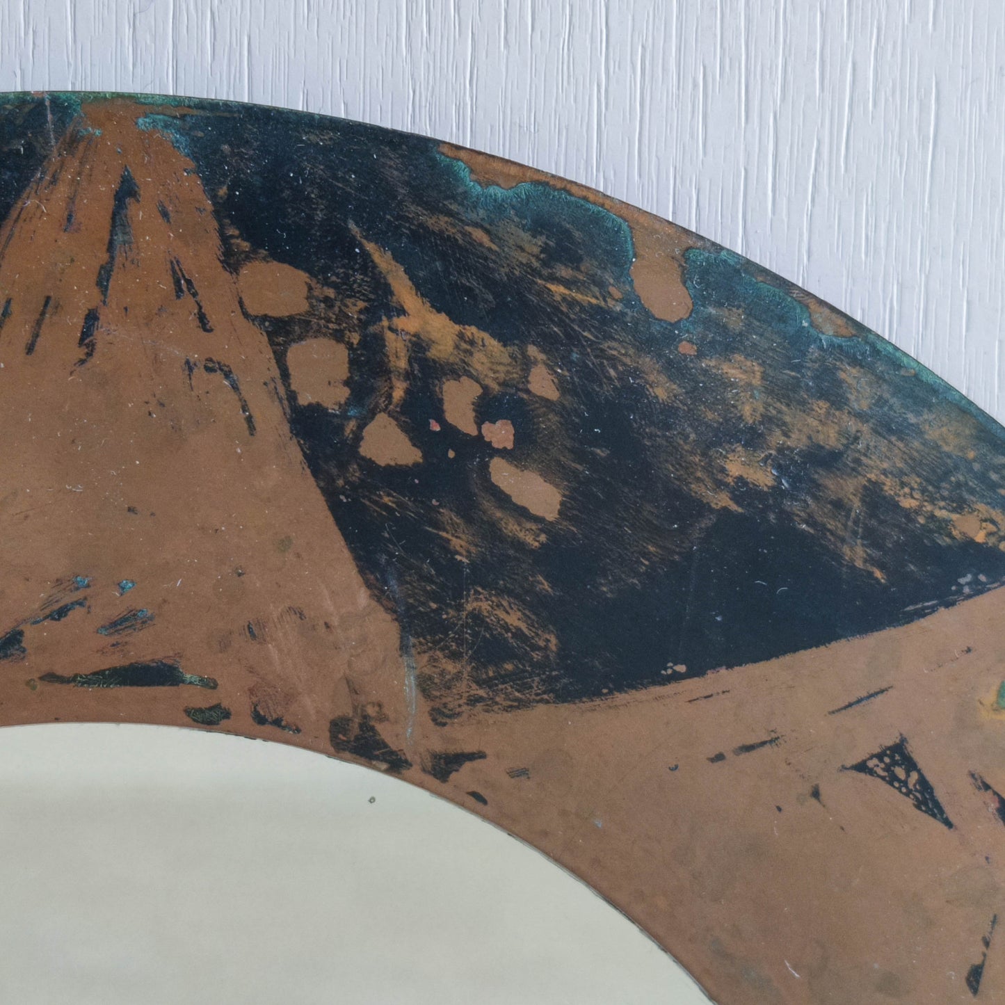 Vintage handmade copper mirror with etched painterly star