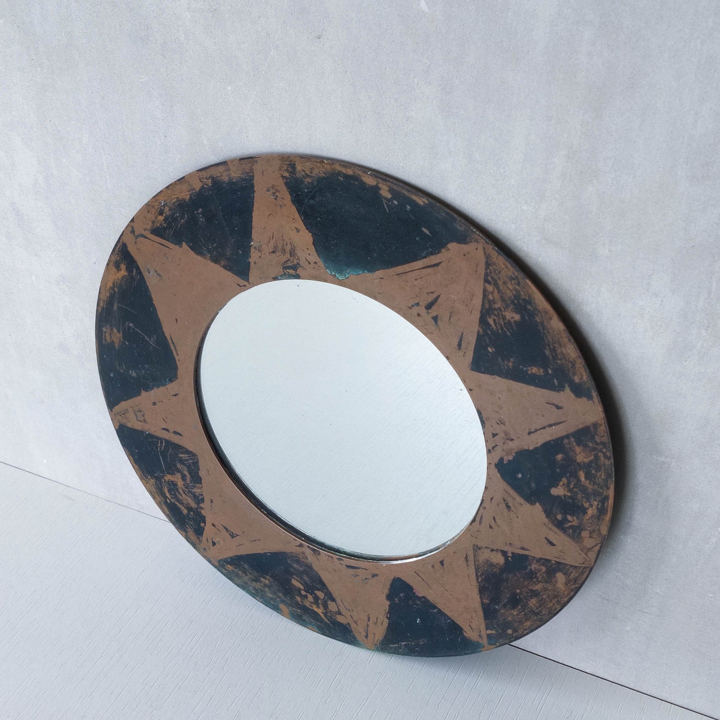 Vintage handmade copper mirror with etched painterly star