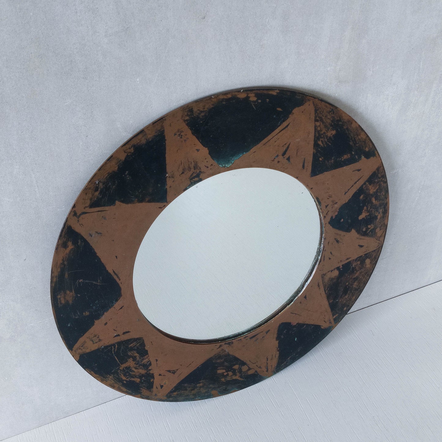 Vintage handmade copper mirror with etched painterly star