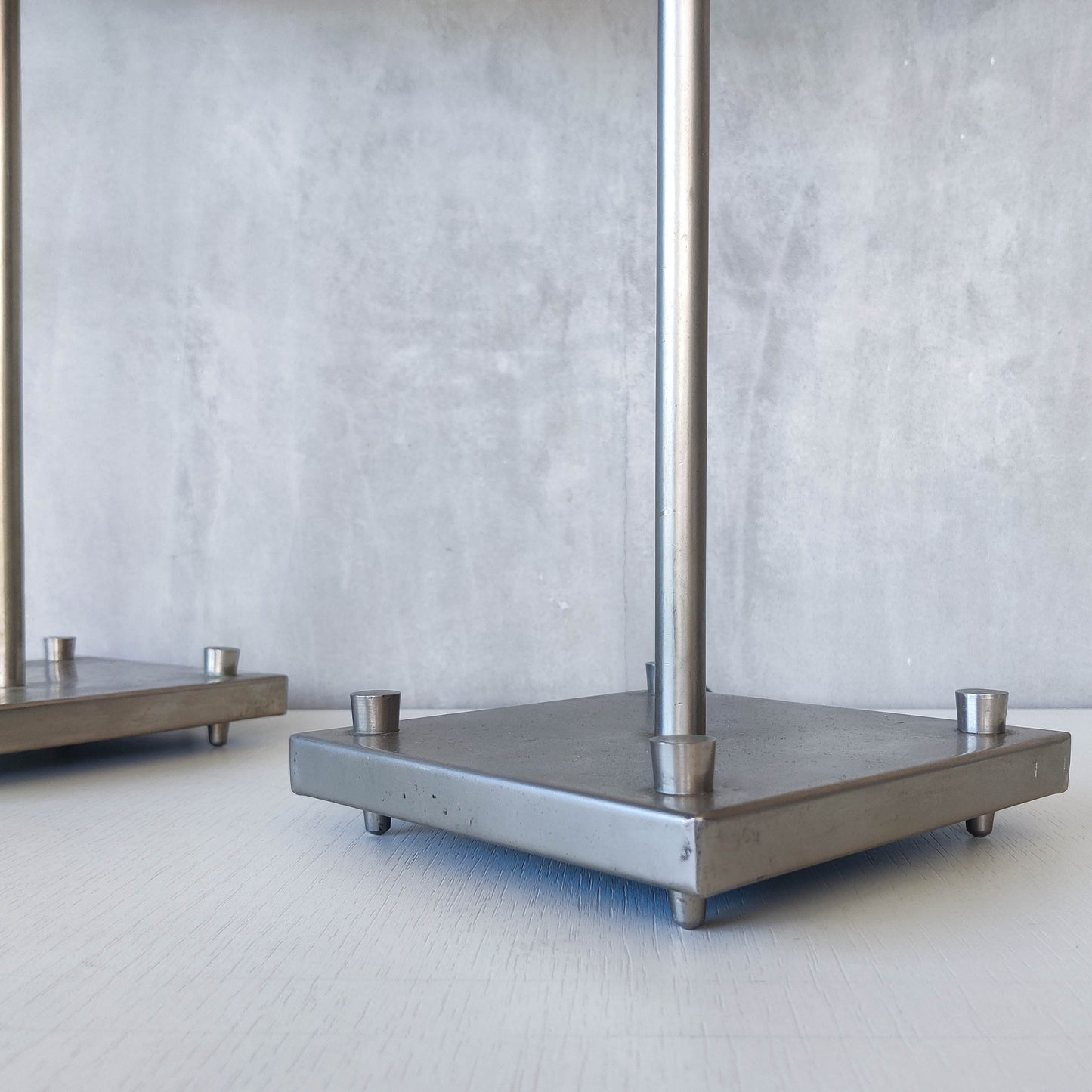 A pair of tall early 1990s Habitat 'Ashrafi' sculptural steel lamps