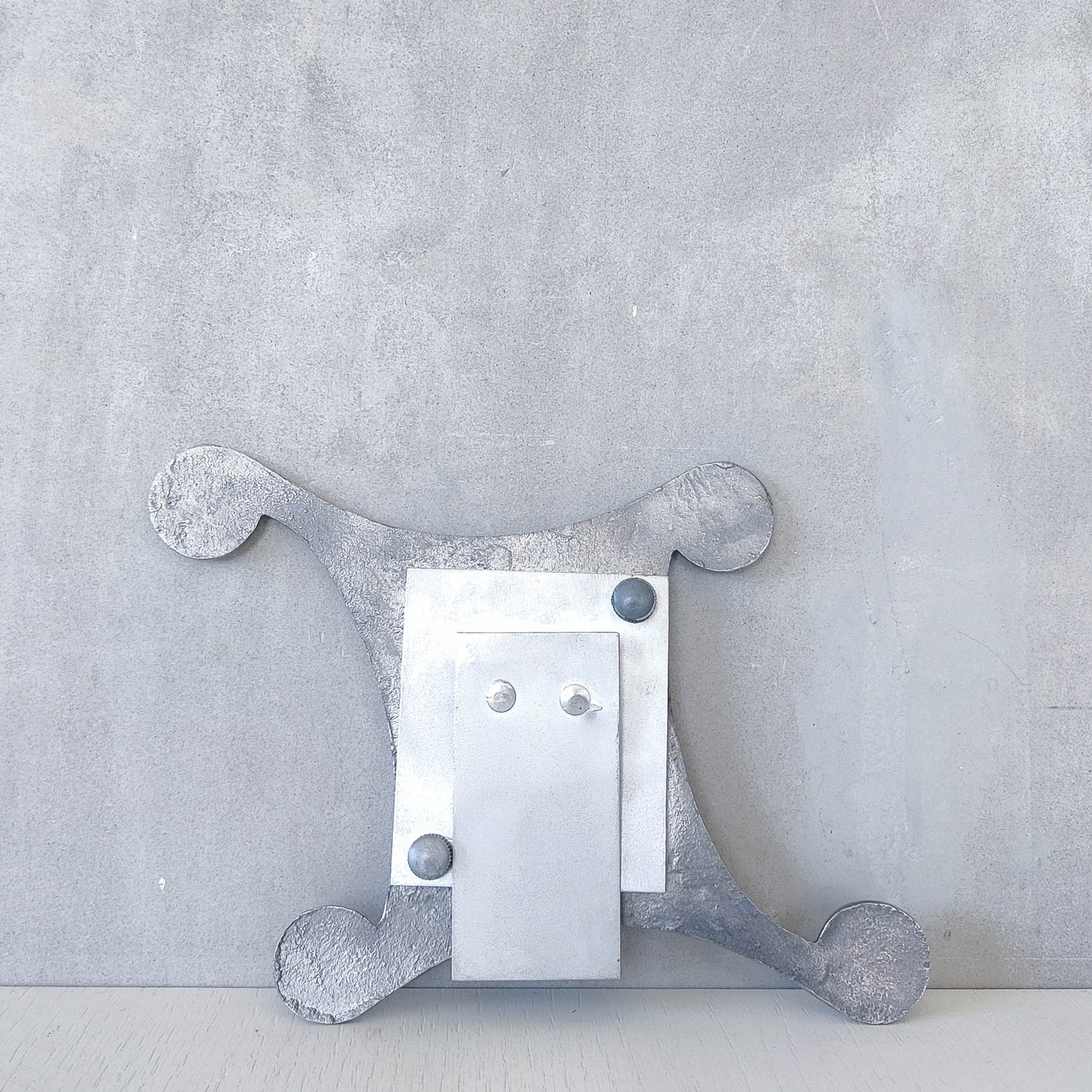 A 1990s cast aluminium photo frame postmodern style with spirals