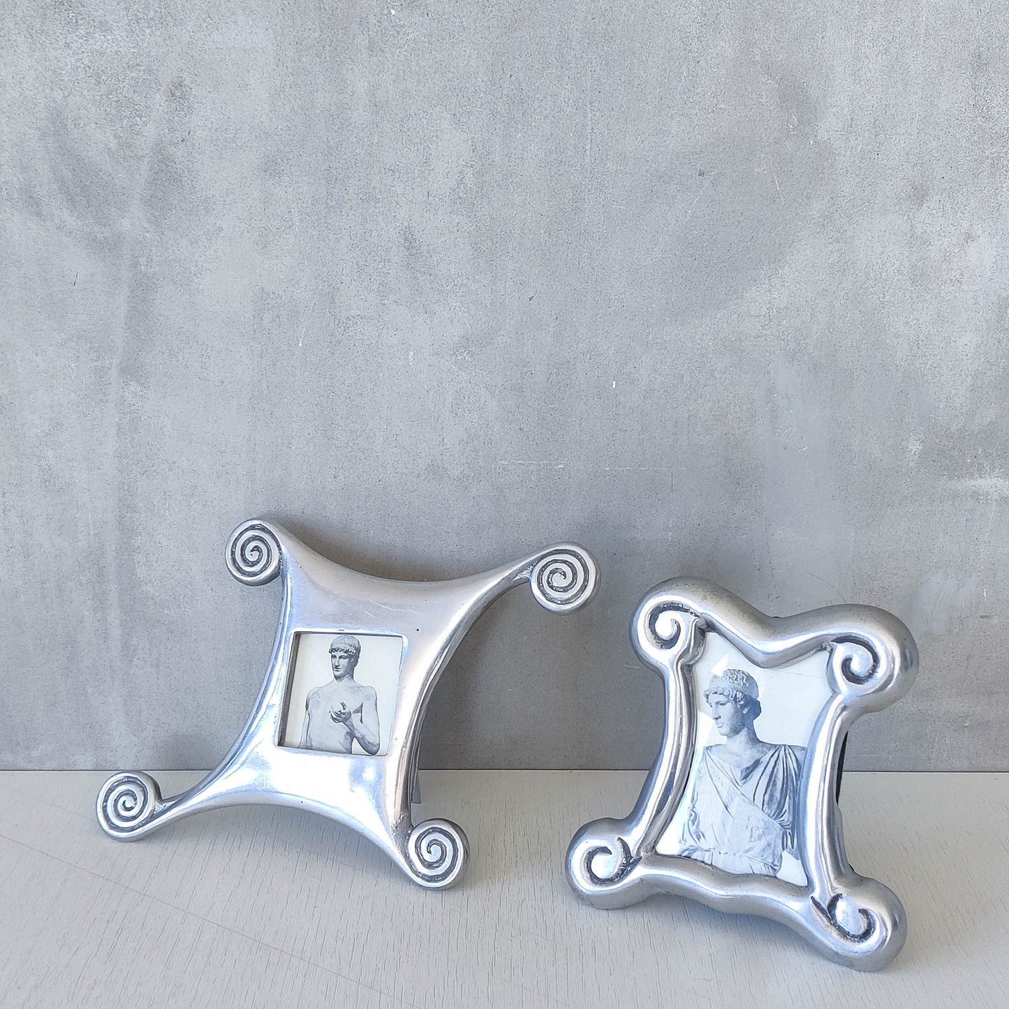 A 1990s cast aluminium photo frame postmodern style with spirals