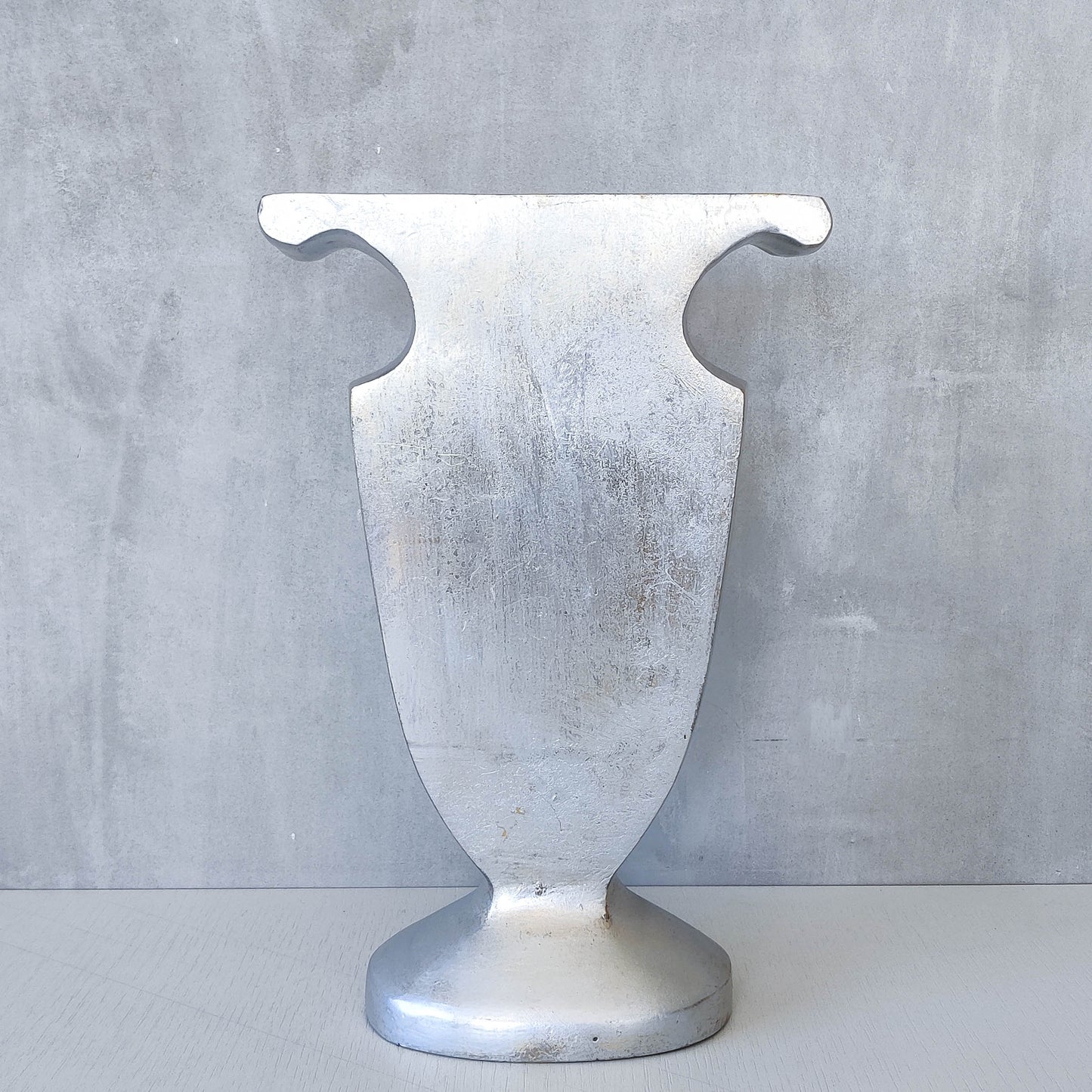 Vintage cast aluminium sculptural urn profile vase