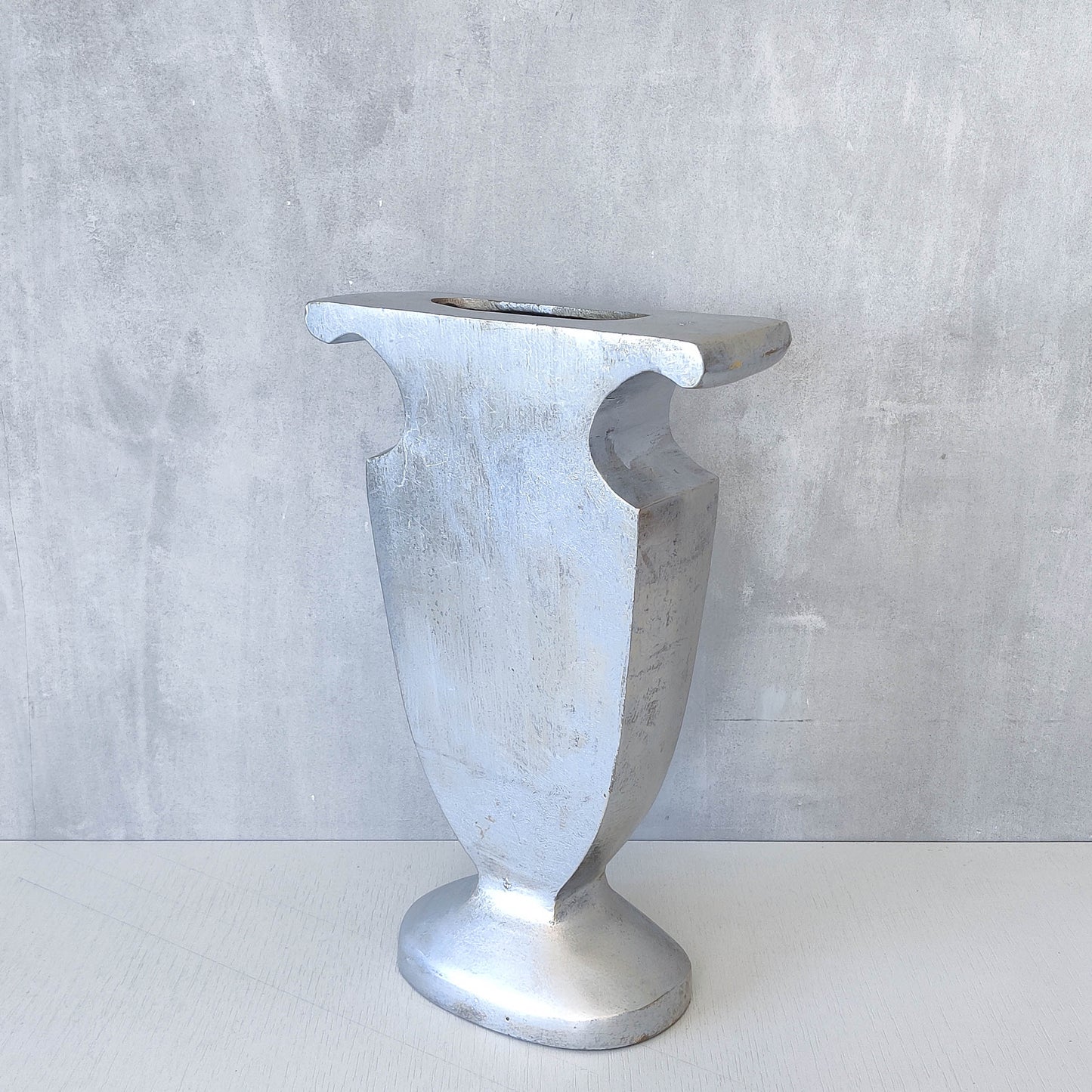 Vintage cast aluminium sculptural urn profile vase