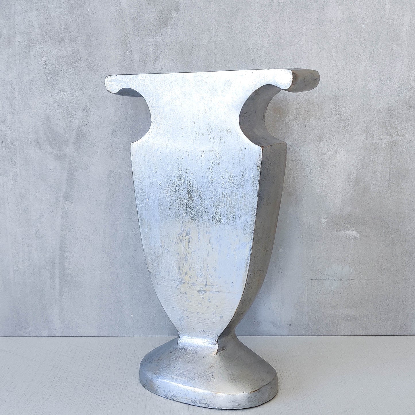 Vintage cast aluminium sculptural urn profile vase