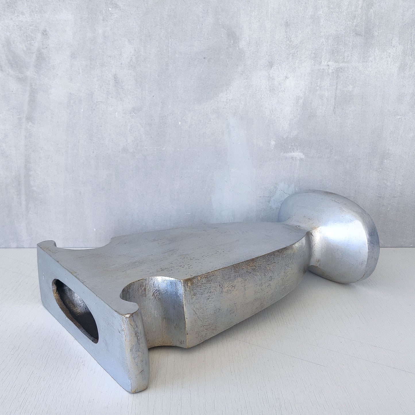Vintage cast aluminium sculptural urn profile vase
