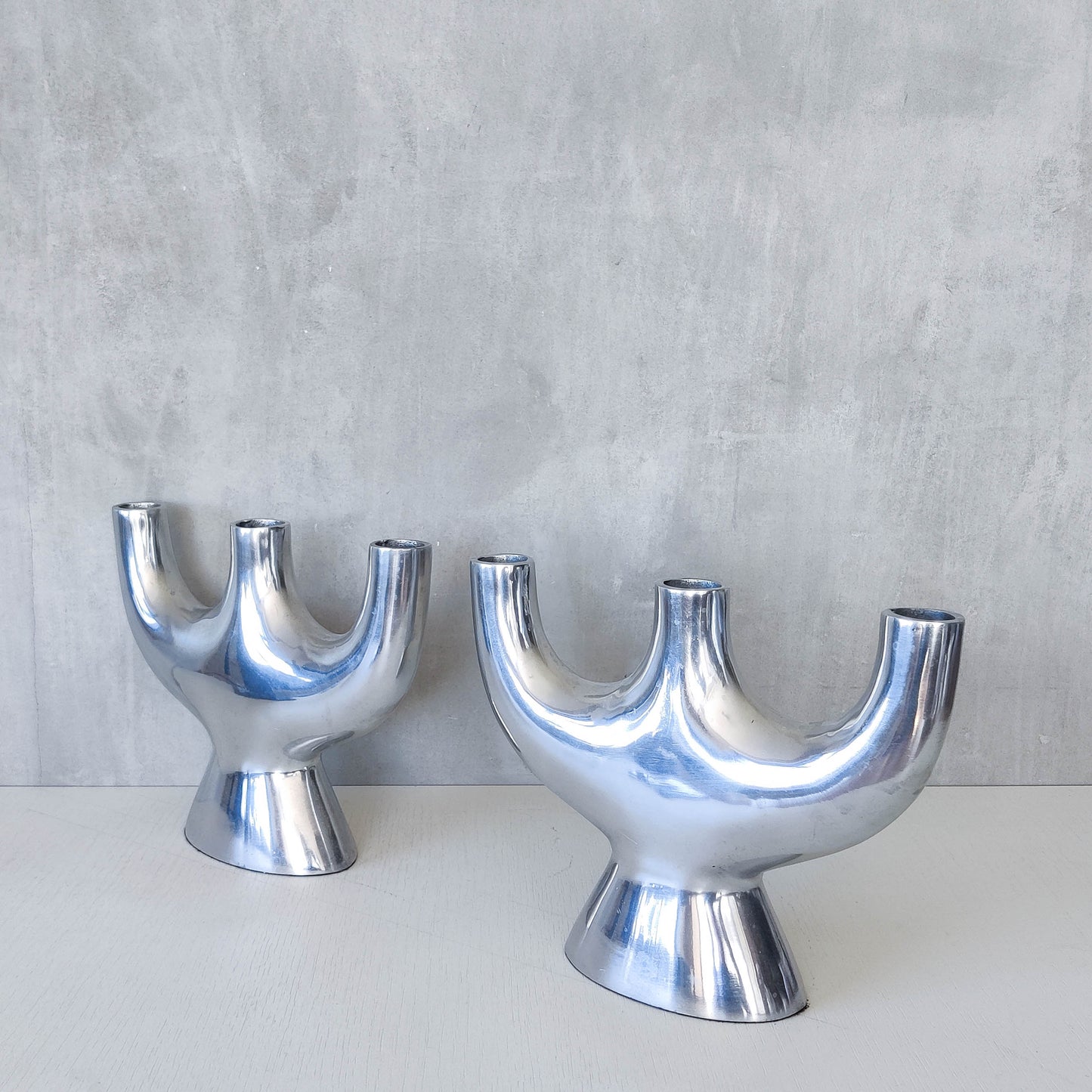 Pair of vintage 00s cast aluminium sculptural tulip vases