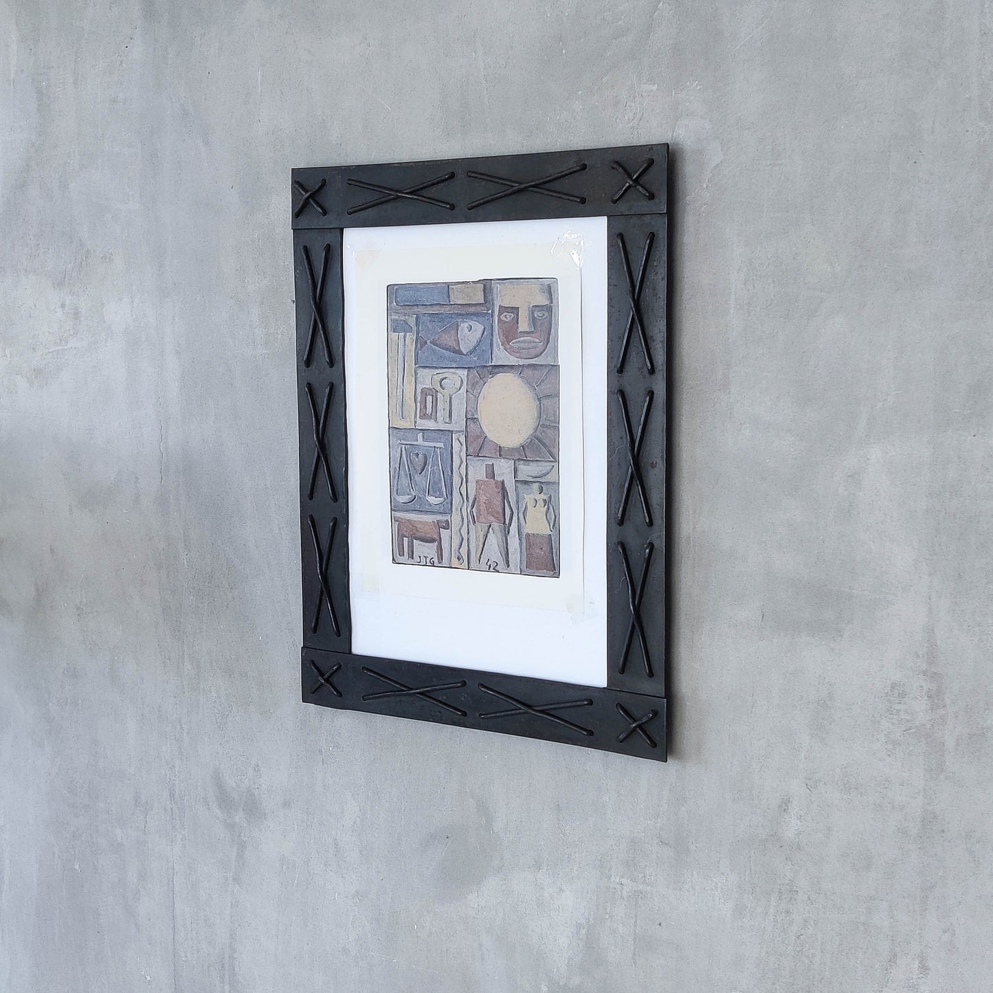 Handmade metalwork welded steel frame with laced cross details