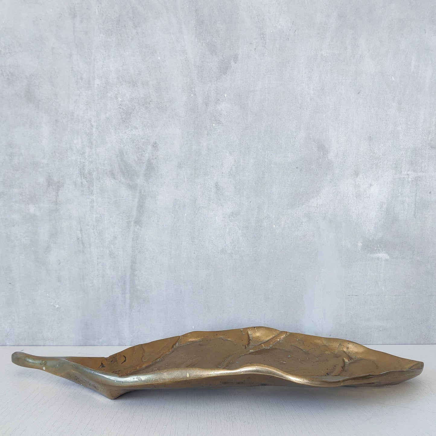 A David Marshall 1980s brutalist sand cast brass large sculptural leaf centrepiece
