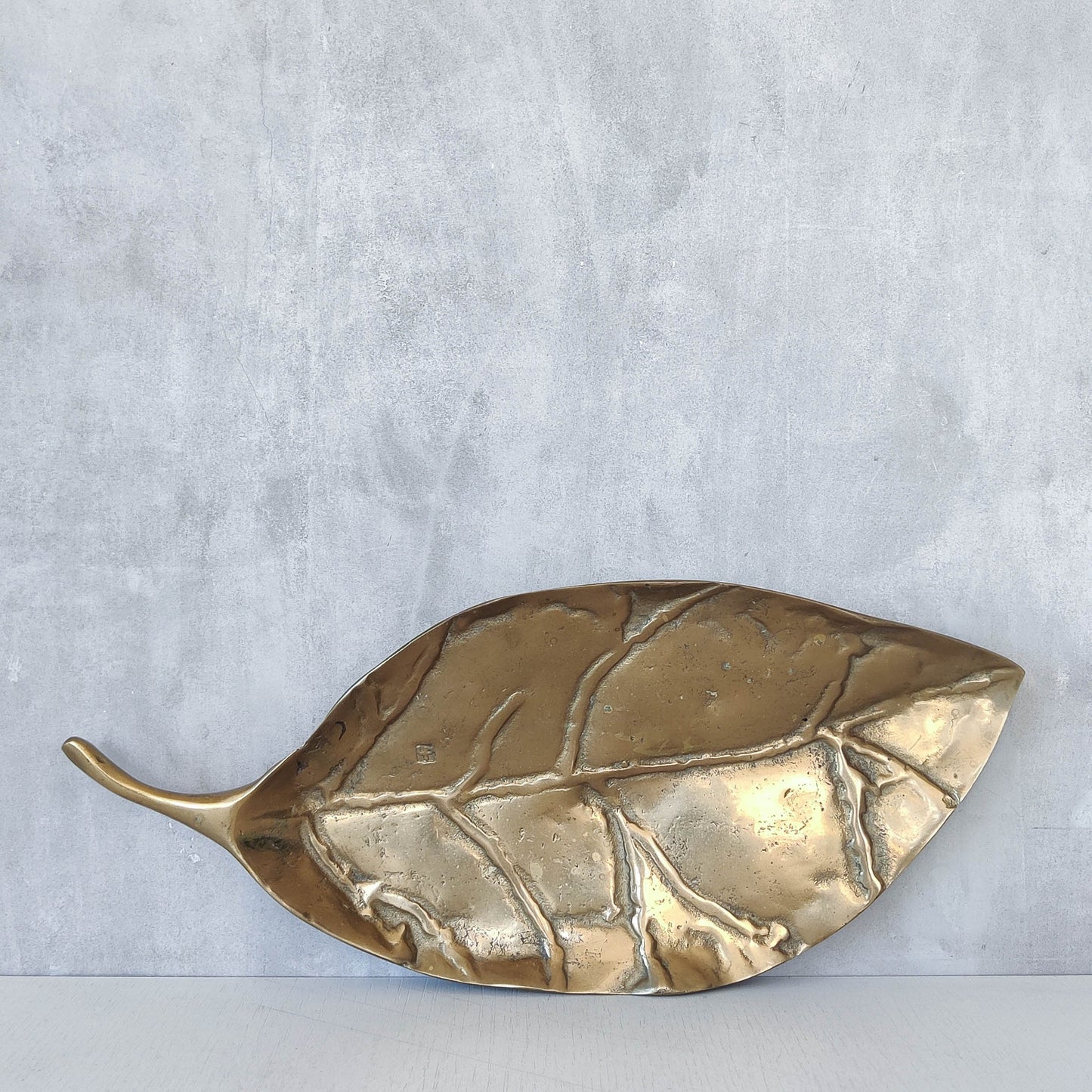 A David Marshall 1980s brutalist sand cast brass large sculptural leaf centrepiece
