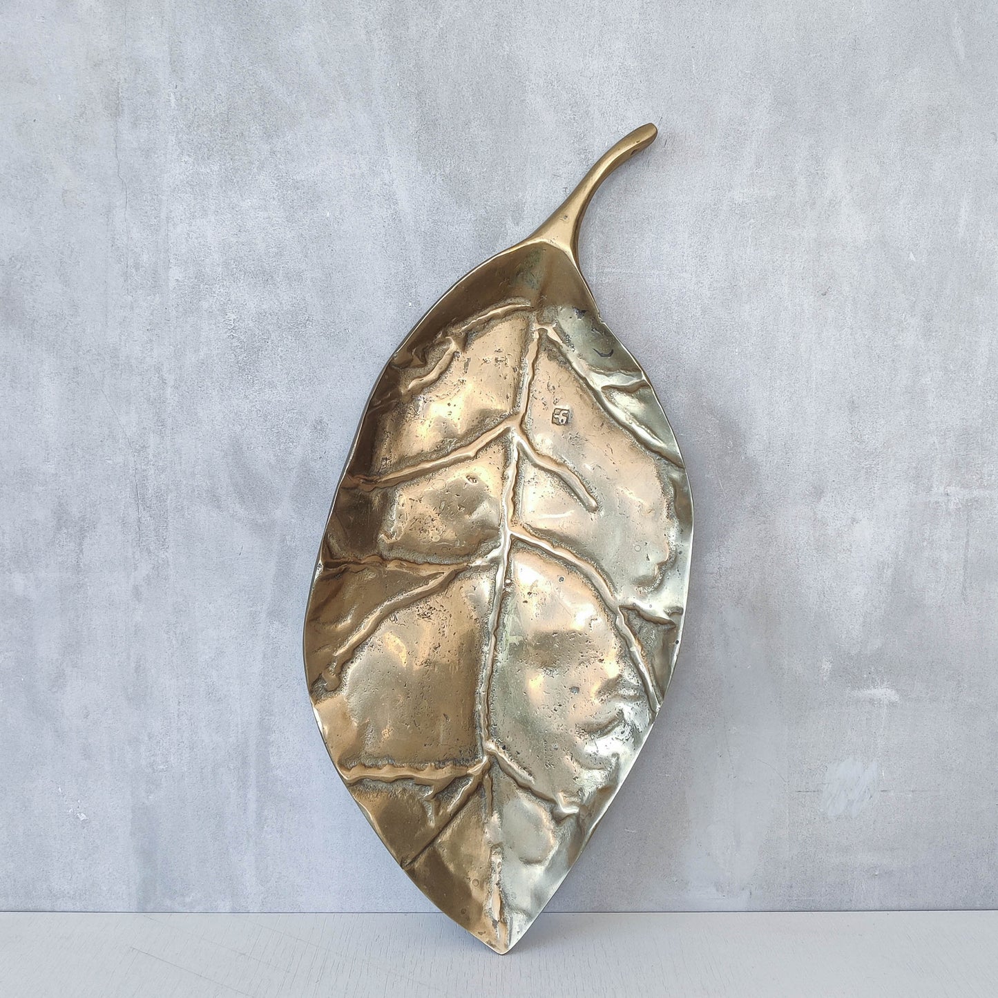 A David Marshall 1980s brutalist sand cast brass large sculptural leaf centrepiece