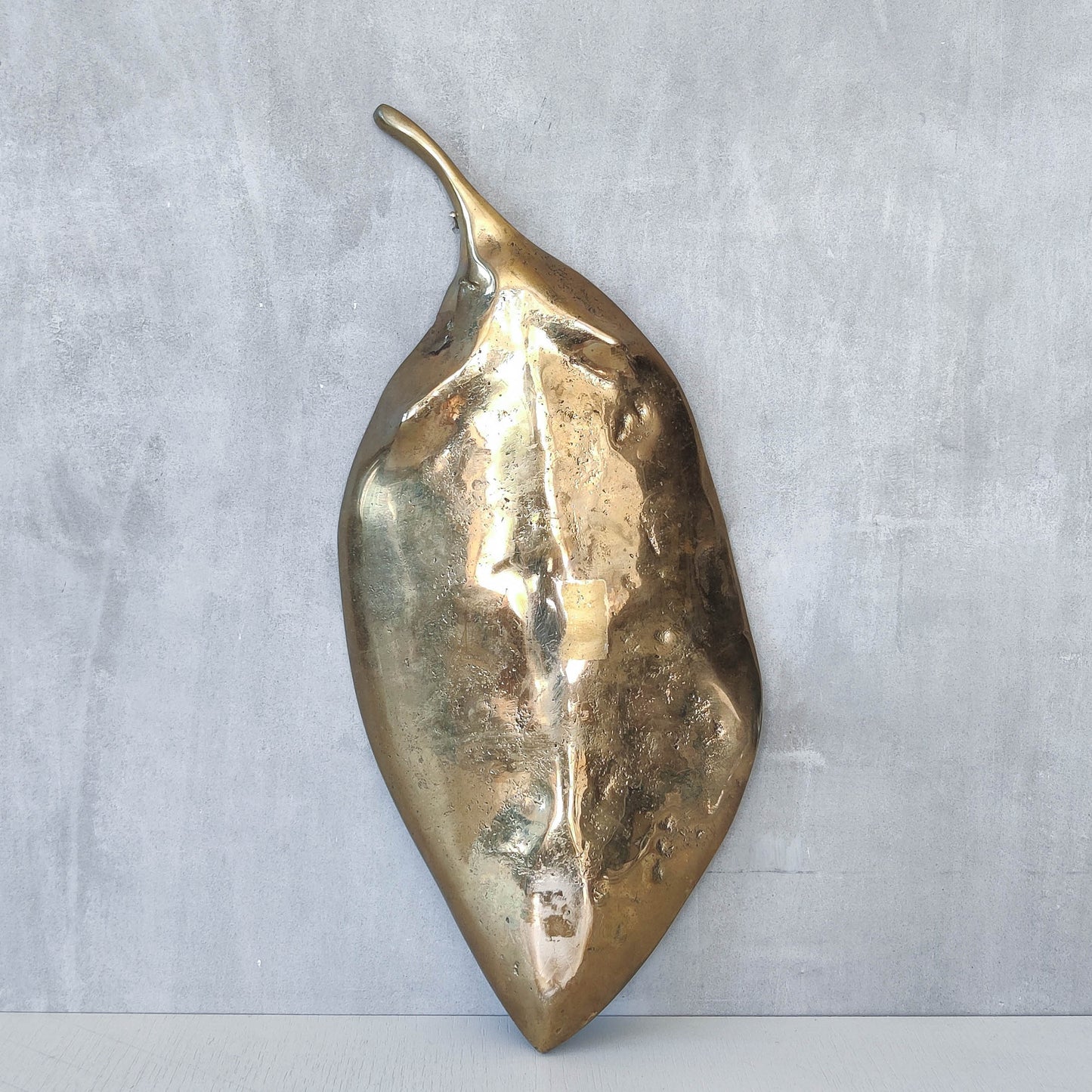 A David Marshall 1980s brutalist sand cast brass large sculptural leaf centrepiece