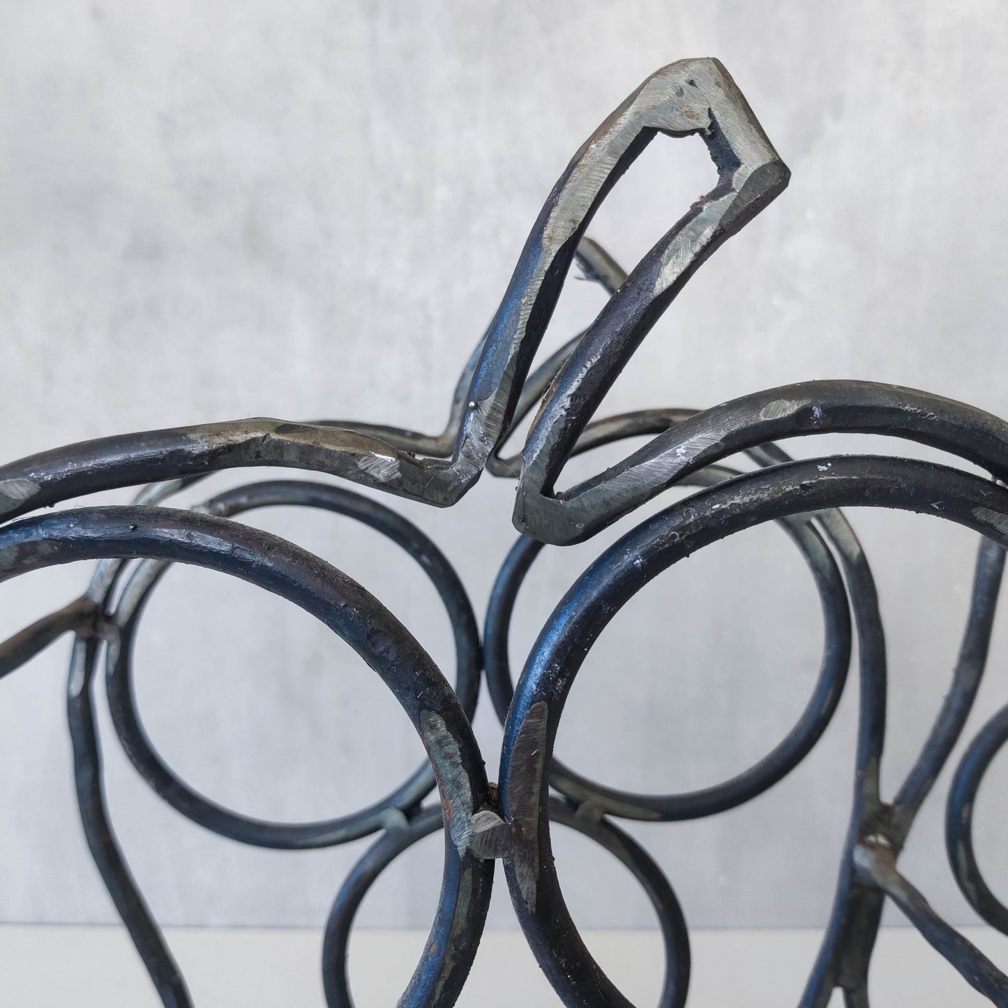 Sculptural metalwork welded steel apple and pear bottle holder