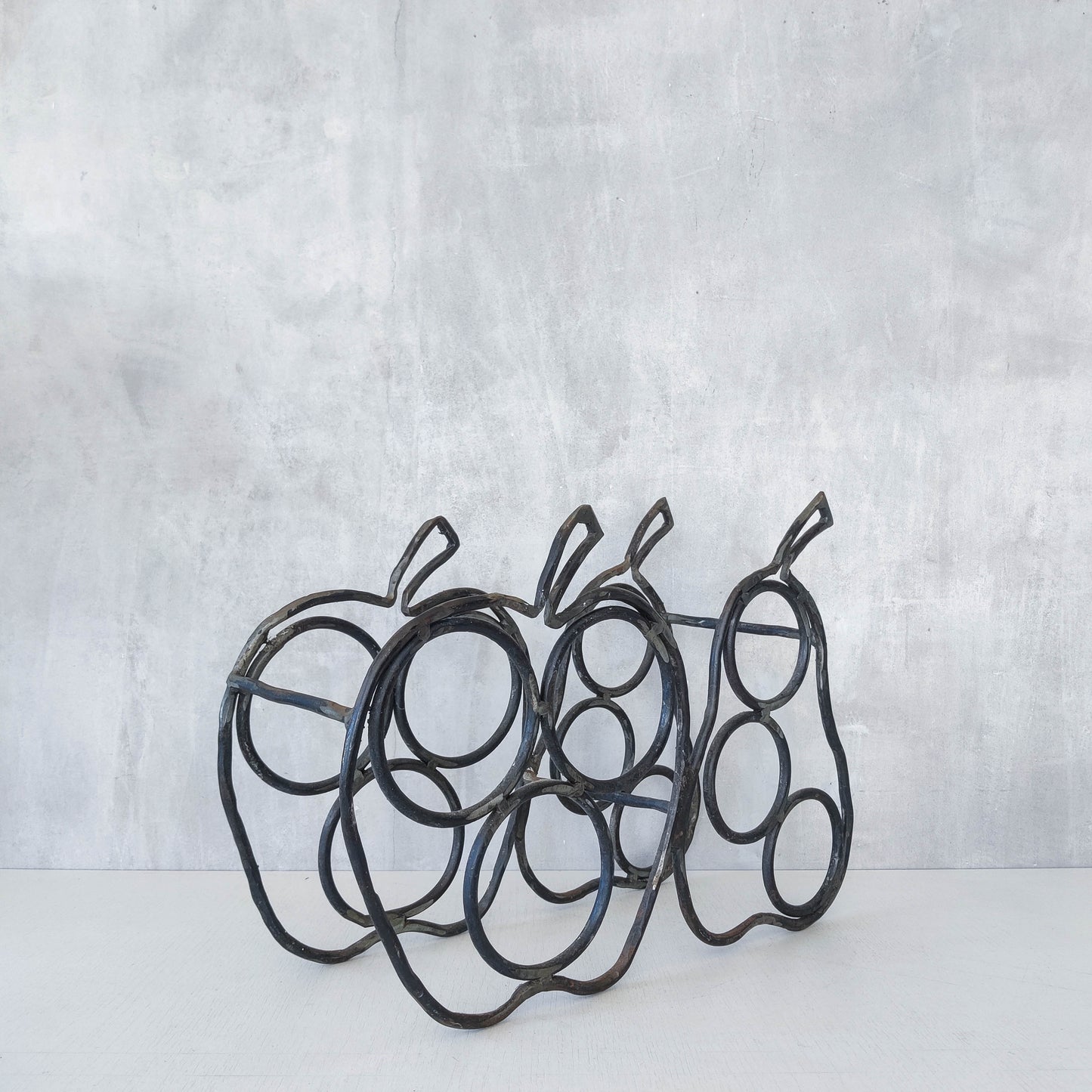 Sculptural metalwork welded steel apple and pear bottle holder