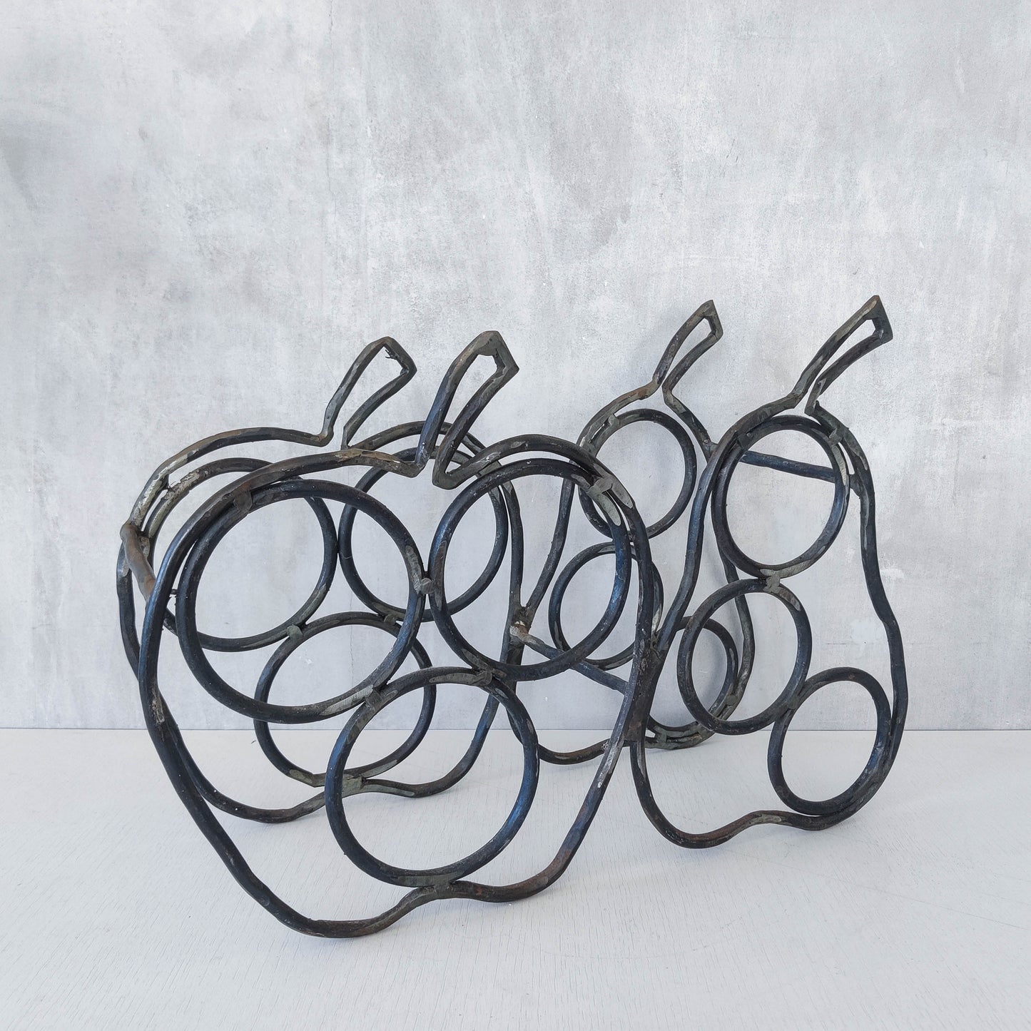 Sculptural metalwork welded steel apple and pear bottle holder