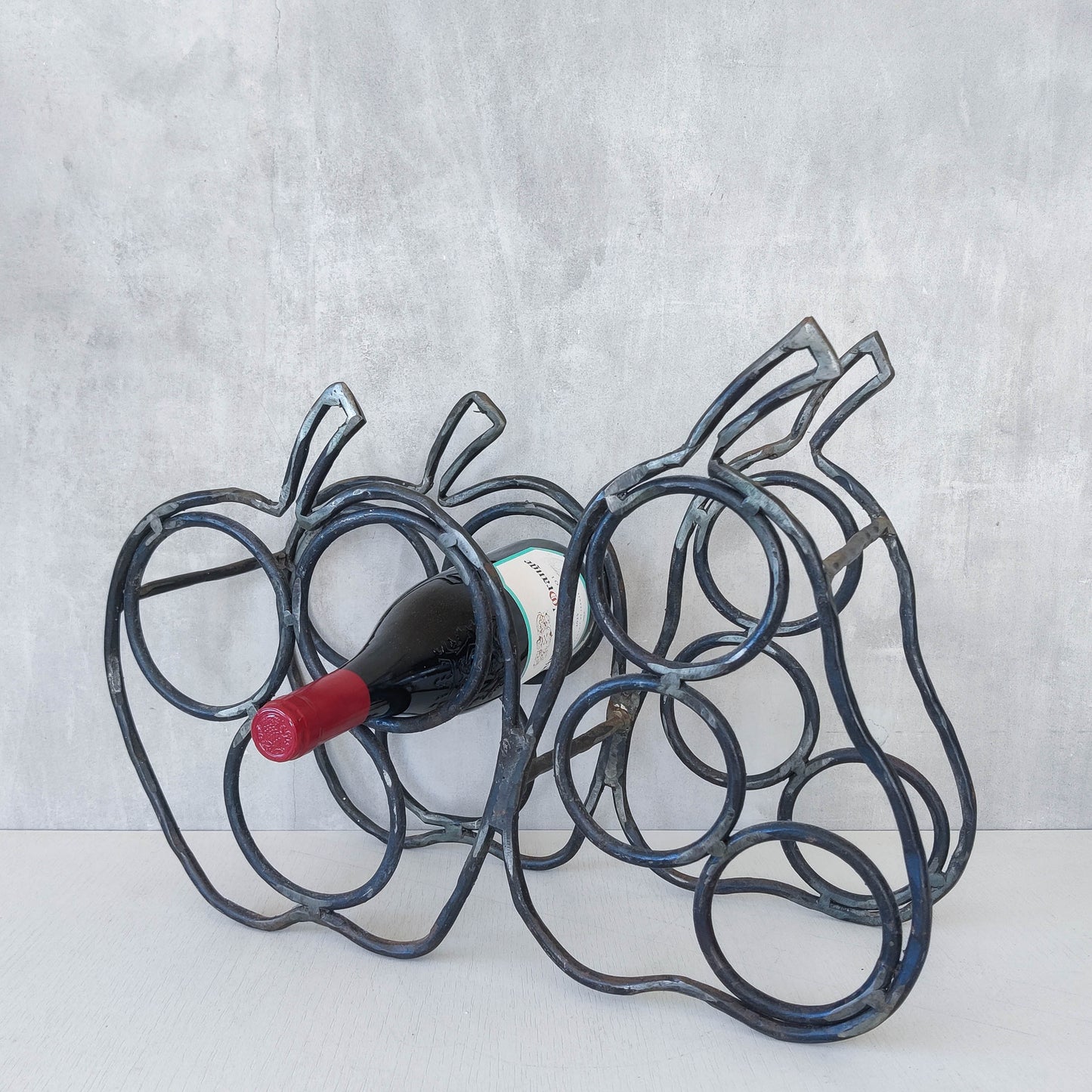 Sculptural metalwork welded steel apple and pear bottle holder