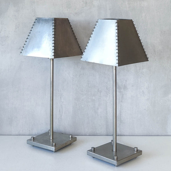 A pair of tall early 1990s Habitat 'Ashrafi' sculptural steel lamps