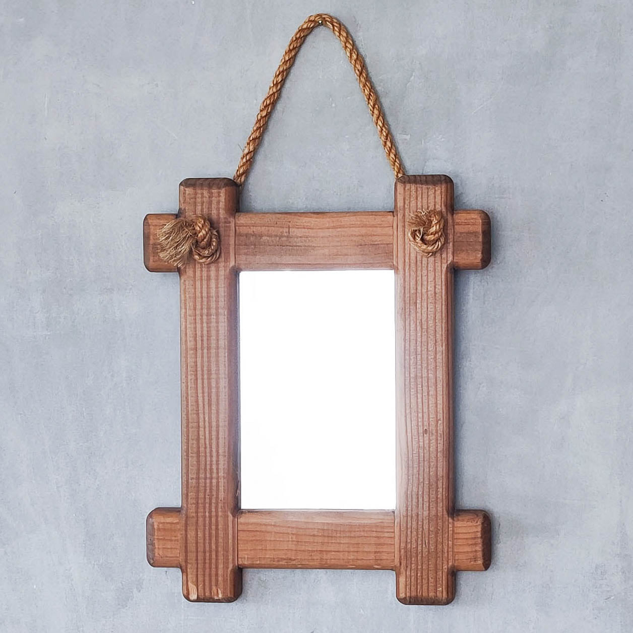 A vintage chunky pine cross corner Oxford frame mirror with knotted rope