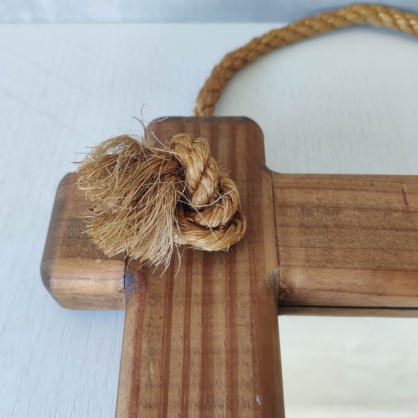 A vintage chunky pine cross corner Oxford frame mirror with knotted rope