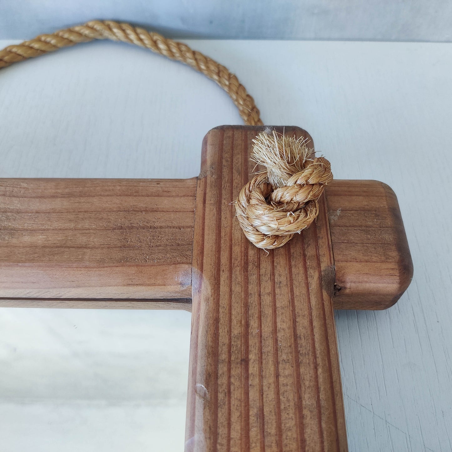A vintage chunky pine cross corner Oxford frame mirror with knotted rope