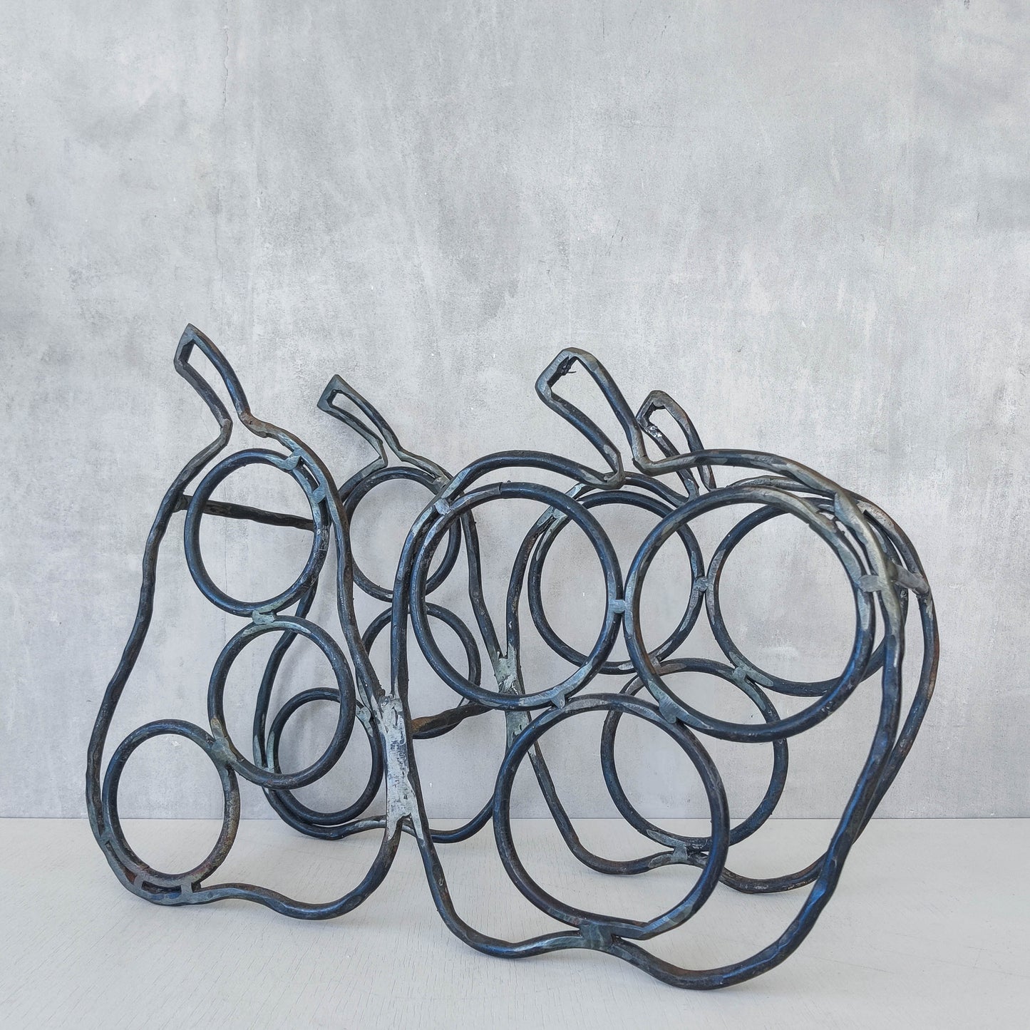 Sculptural metalwork welded steel apple and pear bottle holder