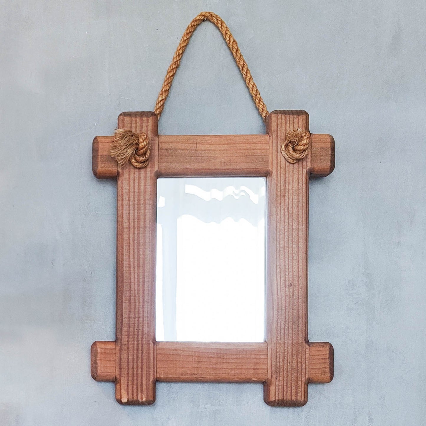A vintage chunky pine cross corner Oxford frame mirror with knotted rope
