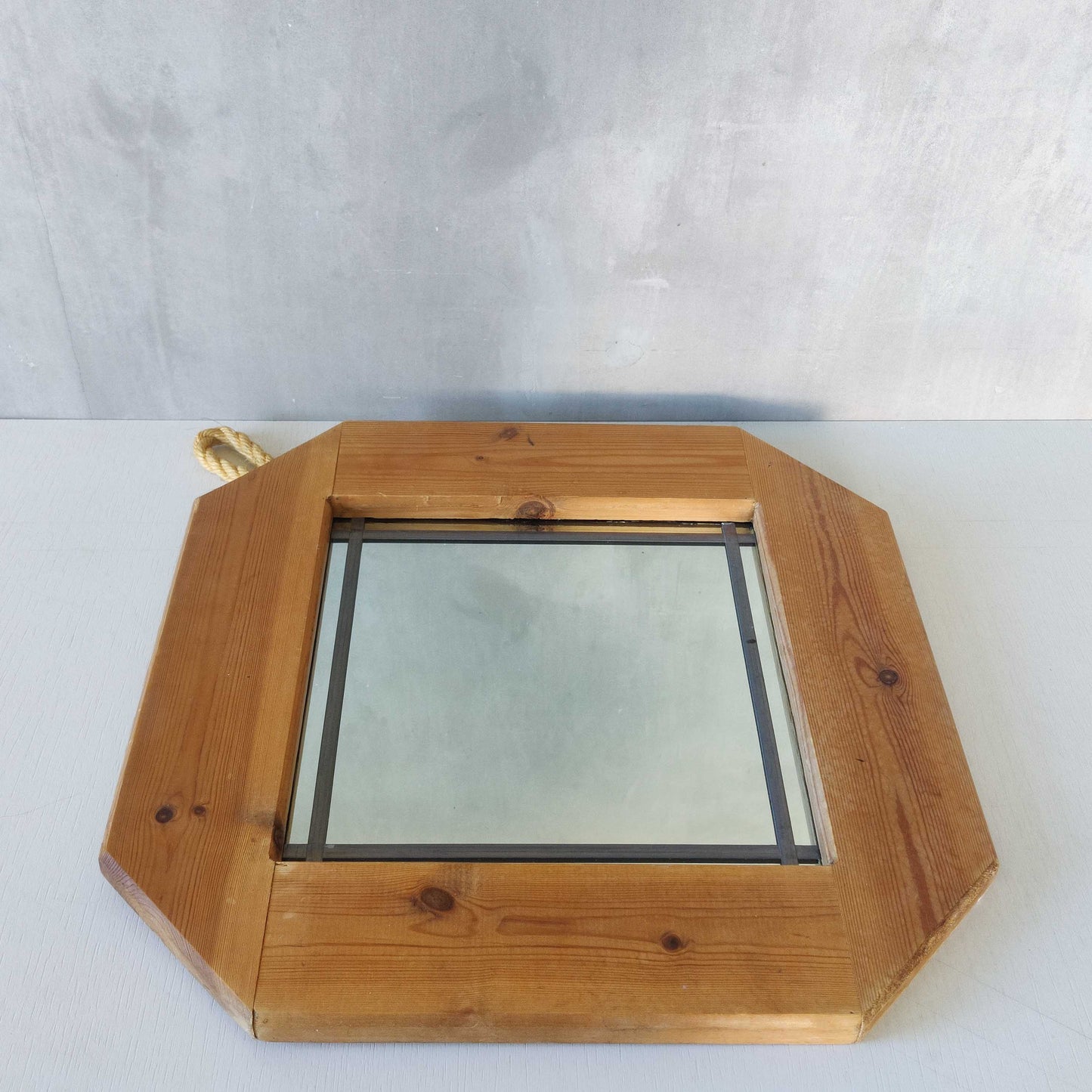 A 1990s pine framed leaded mirror with rope loop