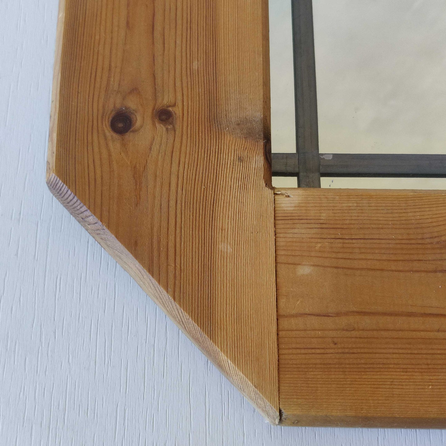 A 1990s pine framed leaded mirror with rope loop