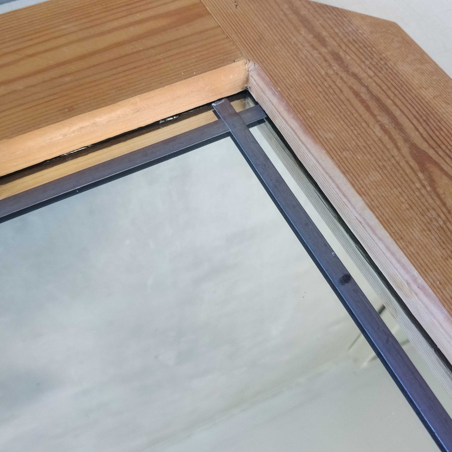 A 1990s pine framed leaded mirror with rope loop