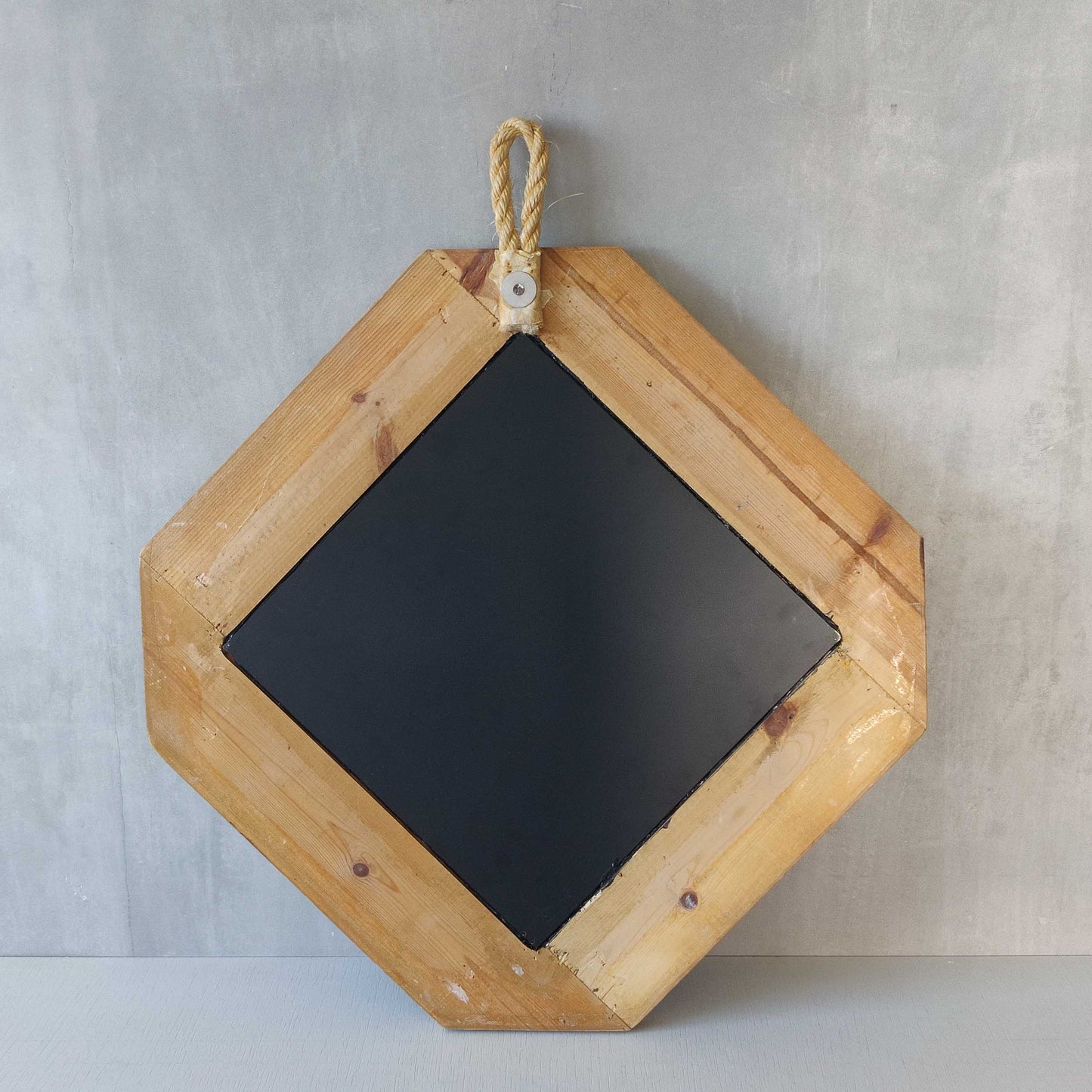 A 1990s pine framed leaded mirror with rope loop