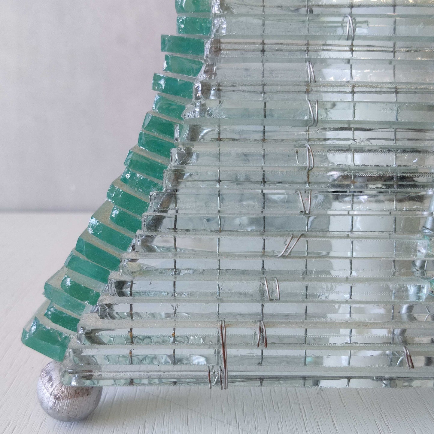 A 1970s stacked glass shard sculptural twisted pyramid lamp