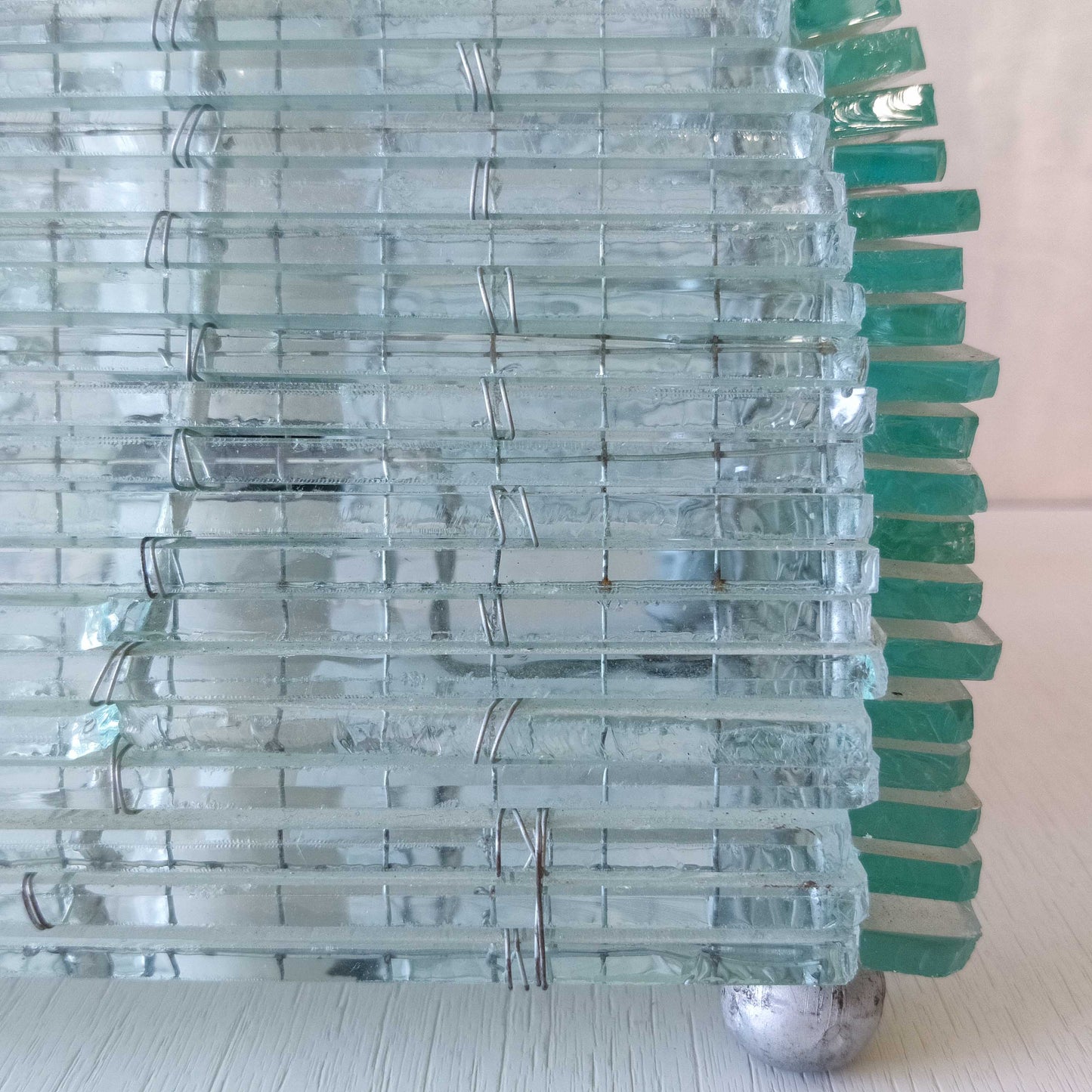 A 1970s stacked glass shard sculptural twisted pyramid lamp